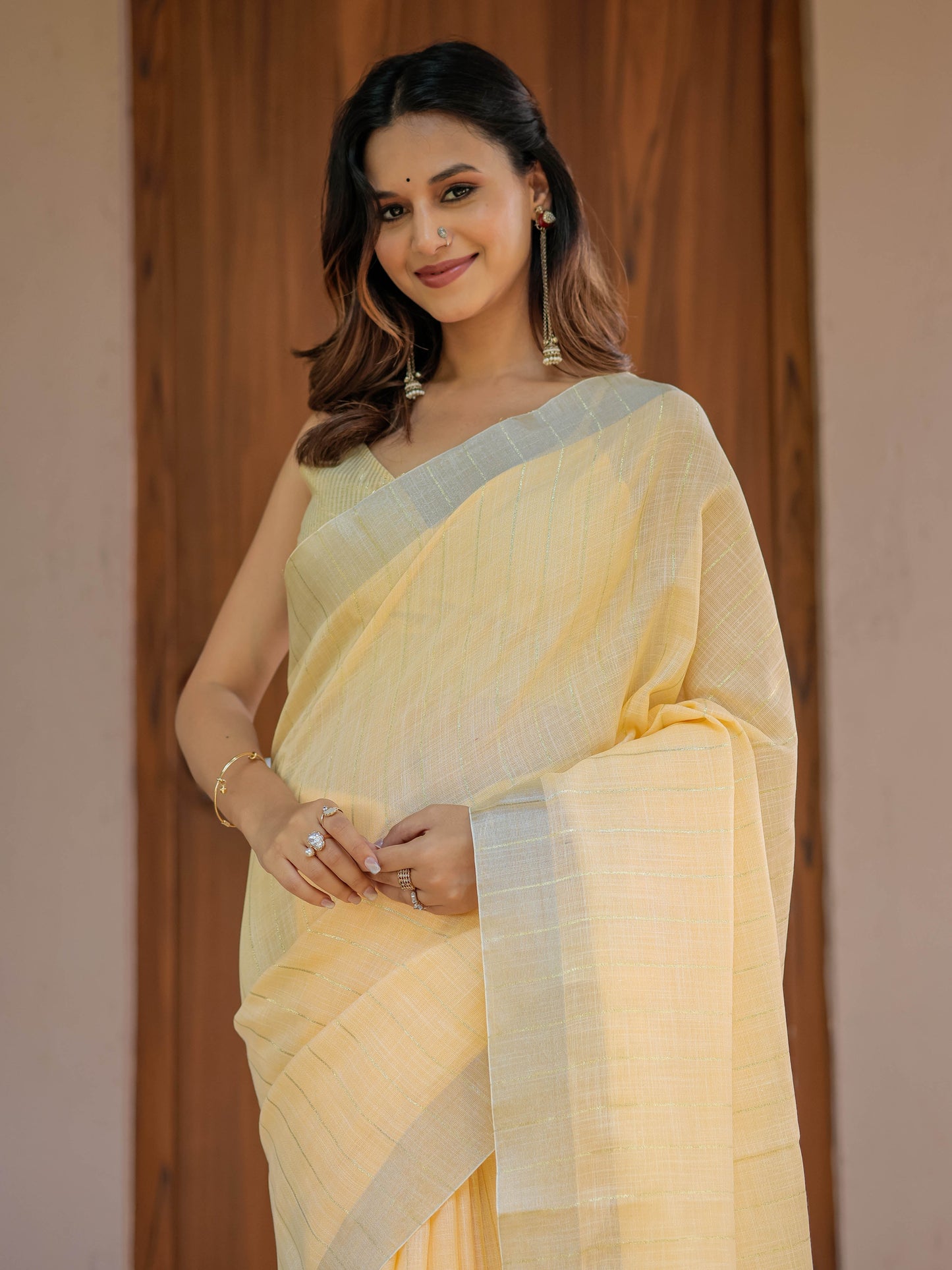 Butter Yellow Pure Handloom Mul Cotton Saree with Golden Striped Weaving & Tassel Detailing
