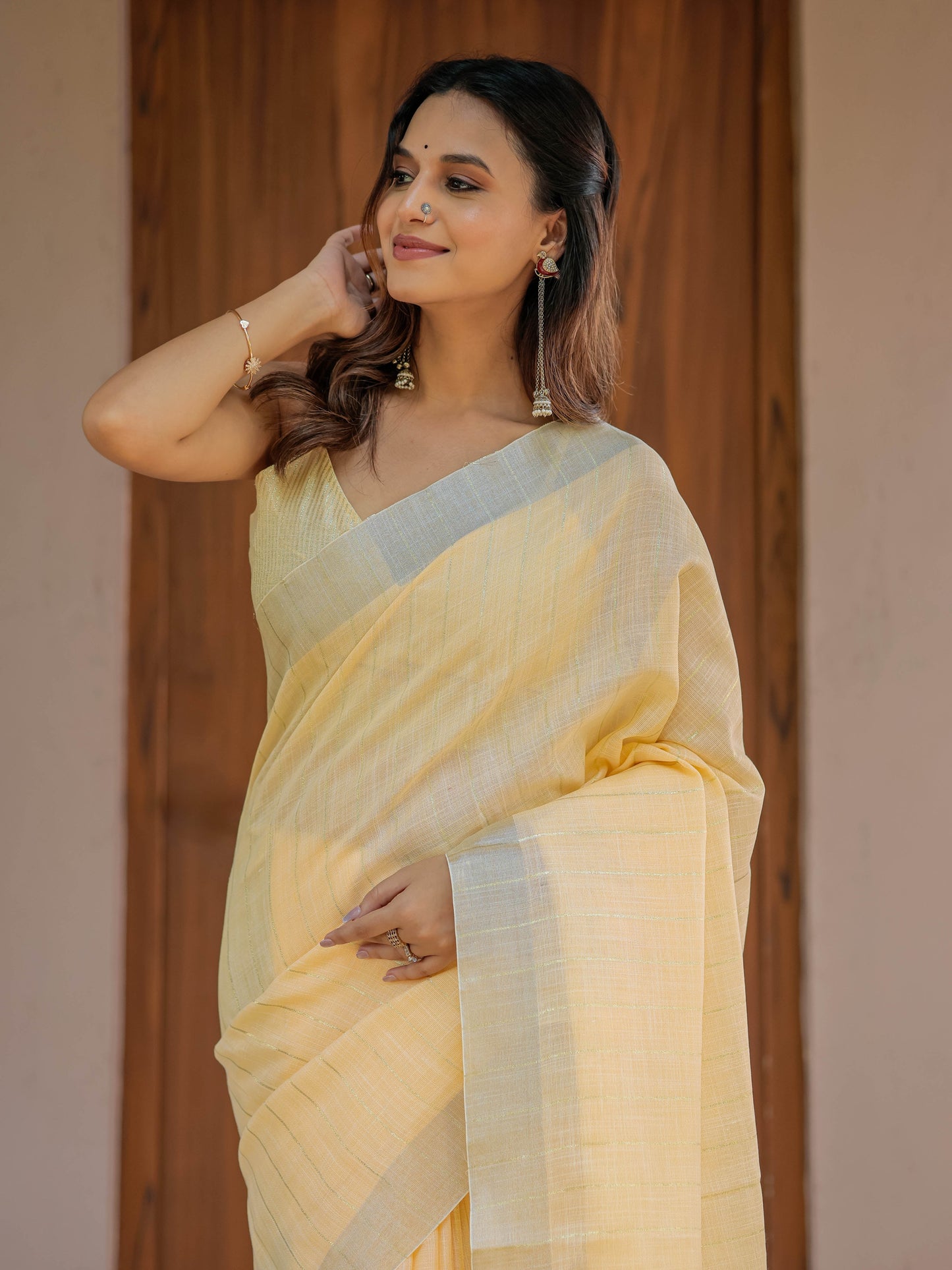Butter Yellow Pure Handloom Mul Cotton Saree with Golden Striped Weaving & Tassel Detailing