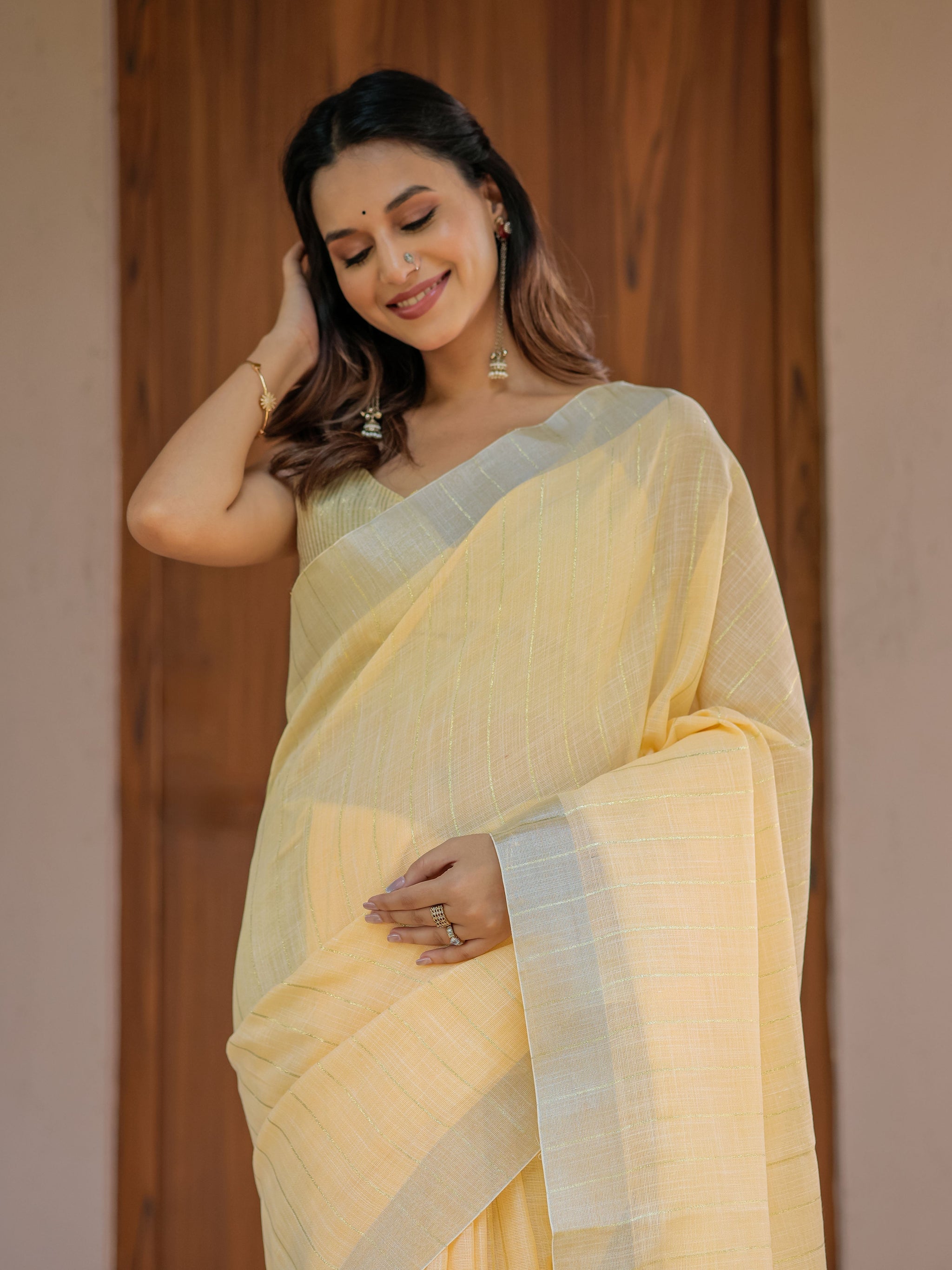 Butter Yellow Pure Handloom Mul Cotton Saree with Golden Striped Weaving & Tassel Detailing