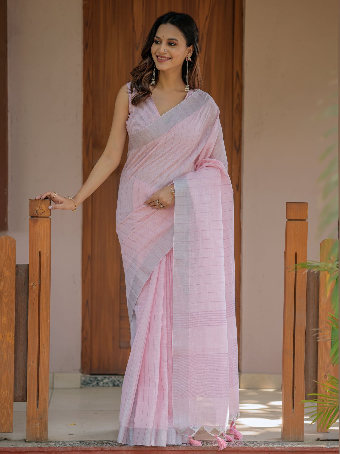 Soft Peach Pink Handloom Mul Cotton Saree with Subtle Striped Weaving & Tassel Detailing