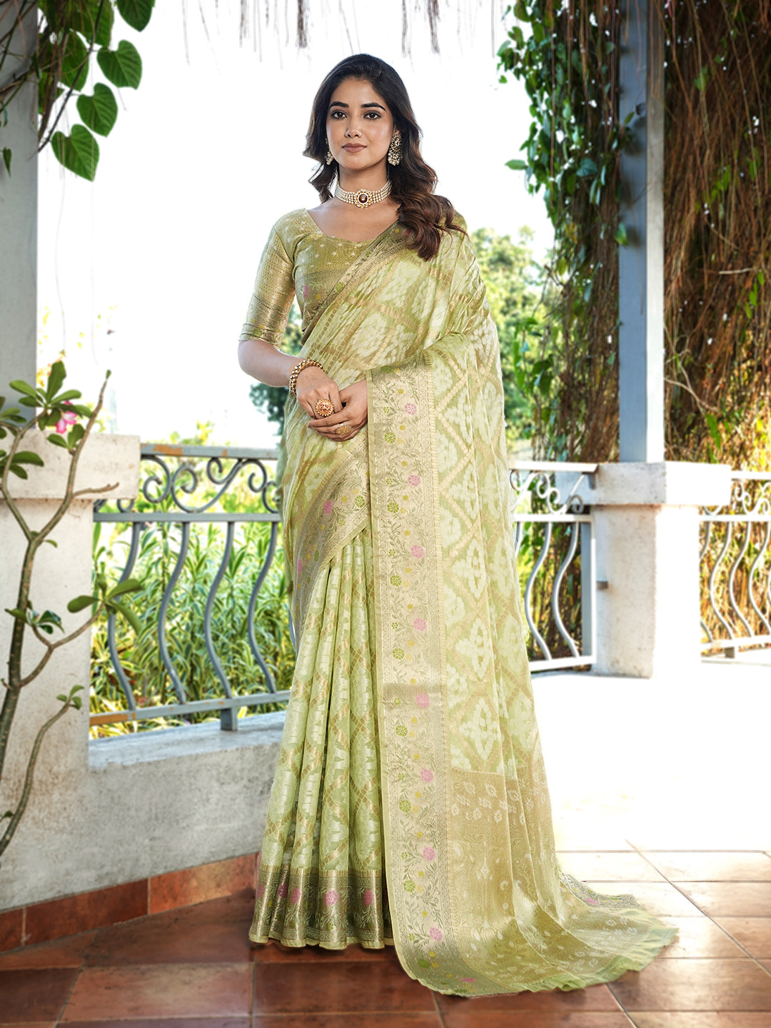 Pista Green Organza Zari Woven Patola Saree