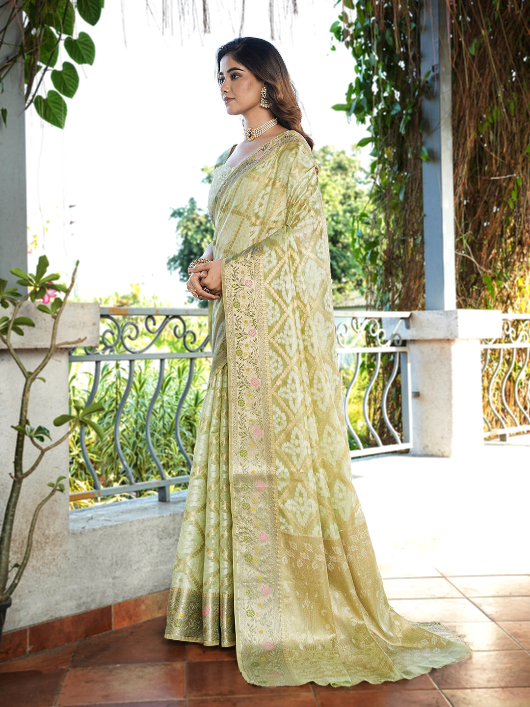 Pista Green Organza Zari Woven Patola Saree