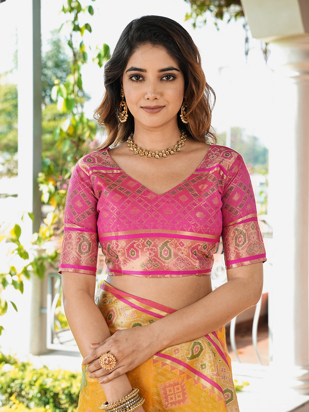 Yellow organza zari woven patola saree