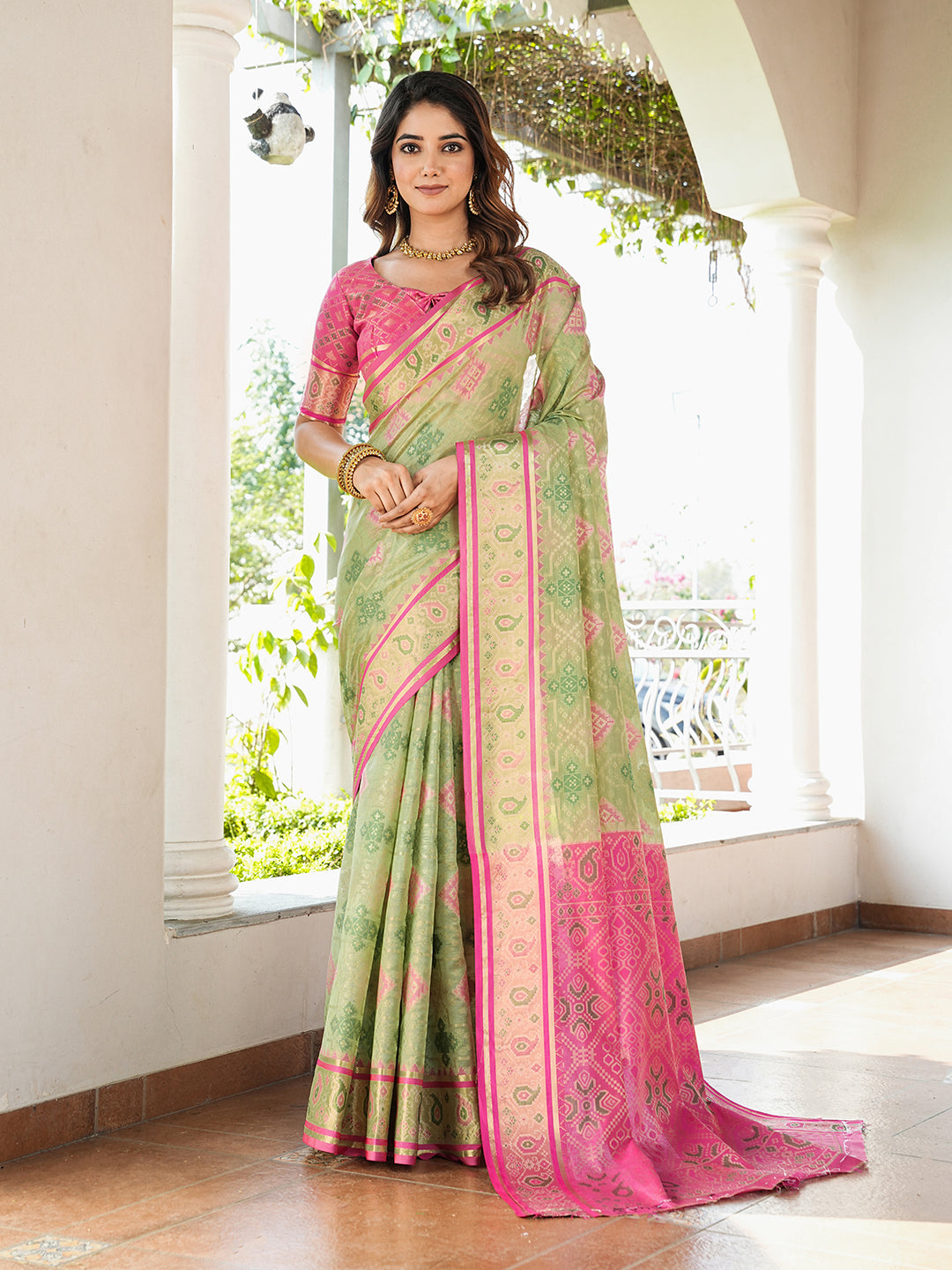 Pista Green Organza Zari Woven Patola Saree