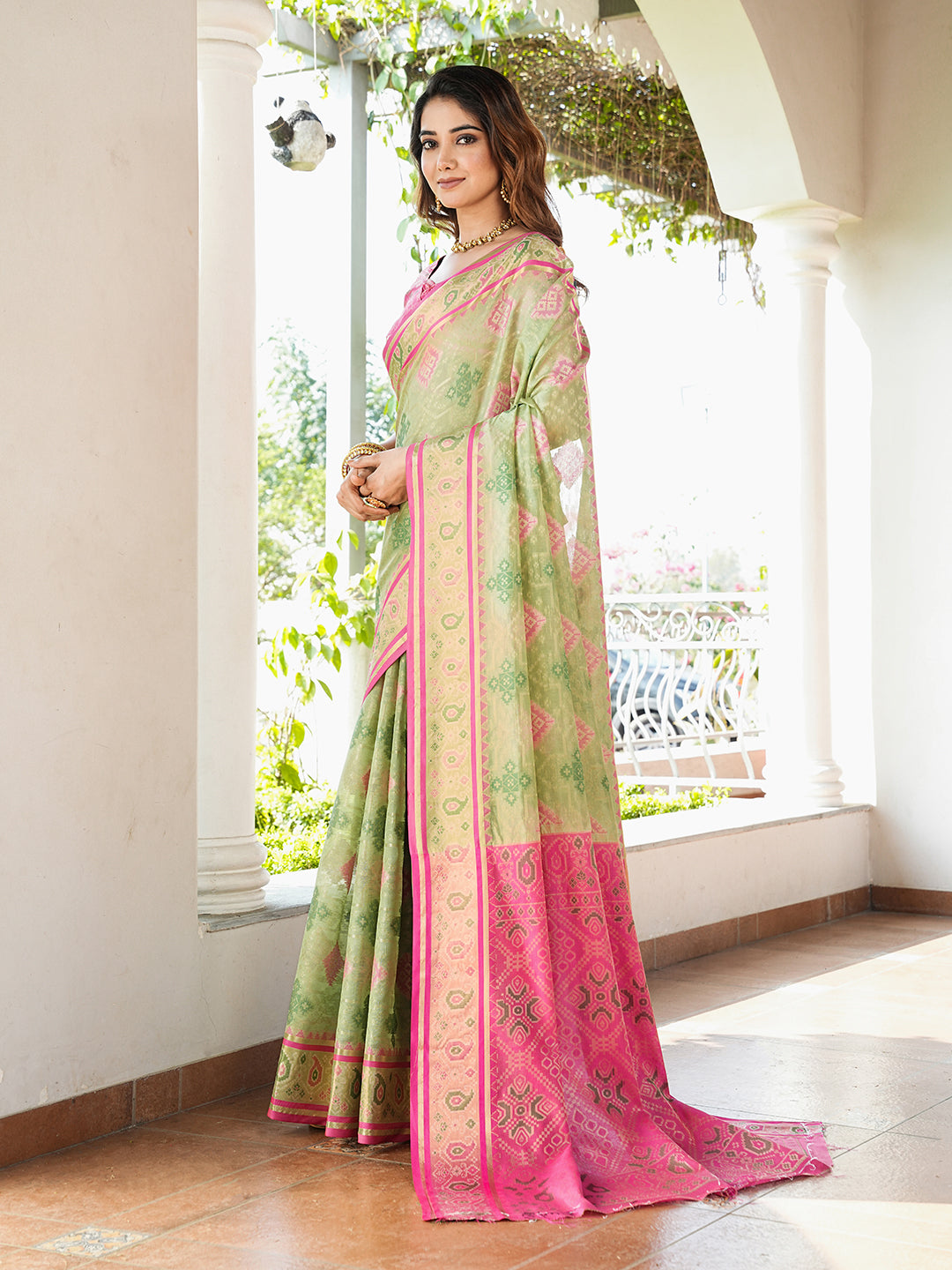 Pista Green Organza Zari Woven Patola Saree