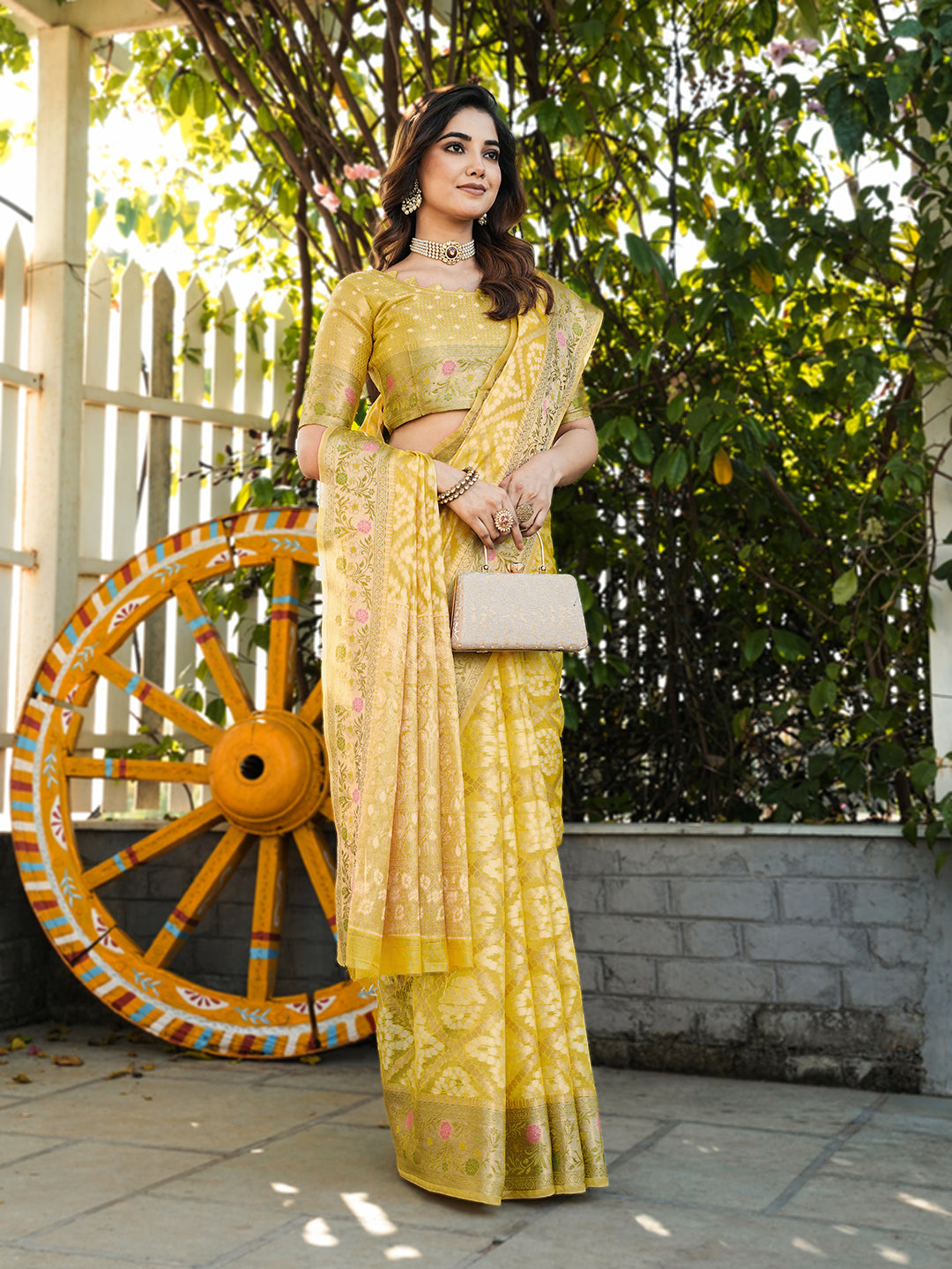 Yellow organza zari woven patola saree