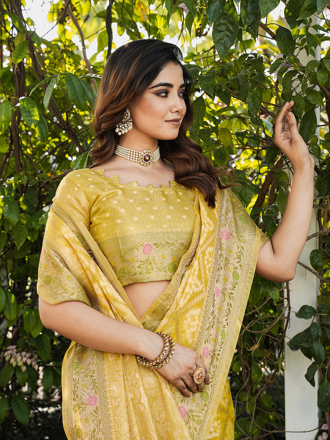 Yellow organza zari woven patola saree