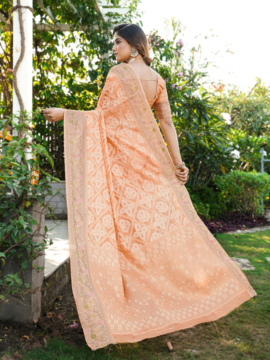 Peach organza zari woven patola saree