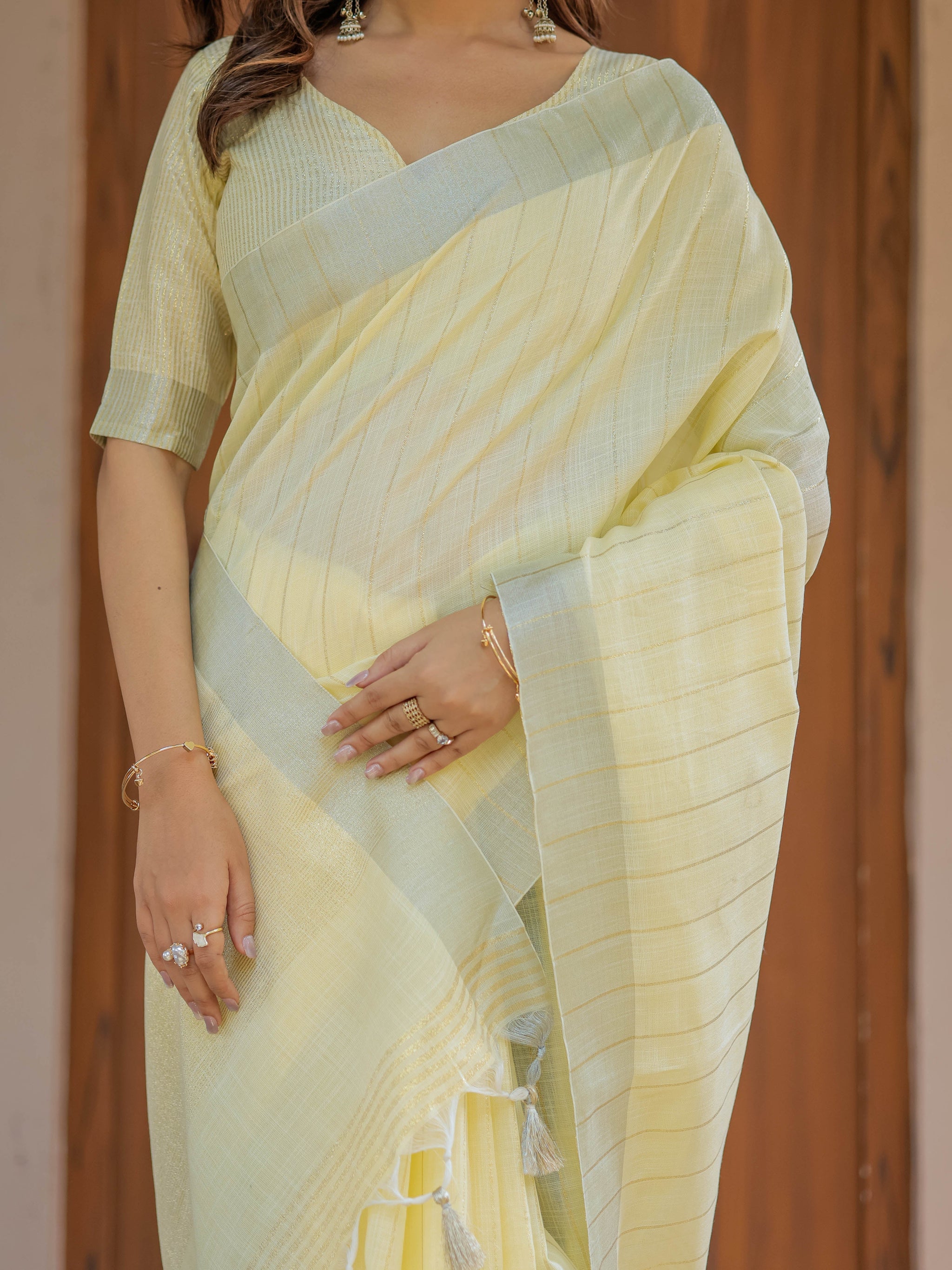 Sunshine Yellow Pure Handloom Mul Cotton Saree with Subtle Striped Weaving & Tassel Detailing