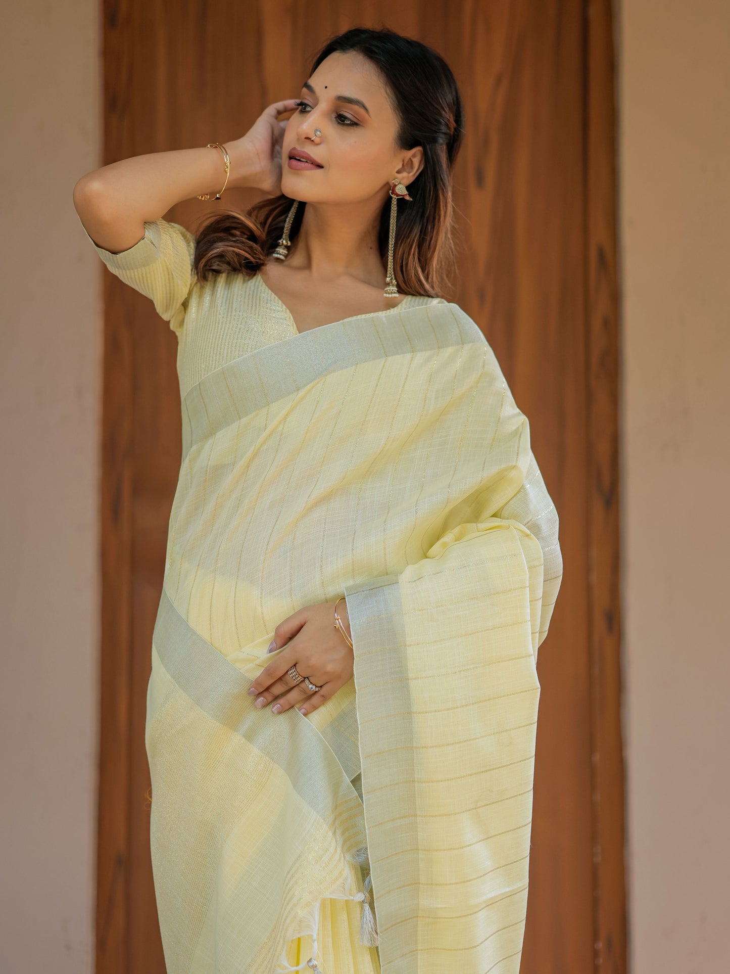 Sunshine Yellow Pure Handloom Mul Cotton Saree with Subtle Striped Weaving & Tassel Detailing