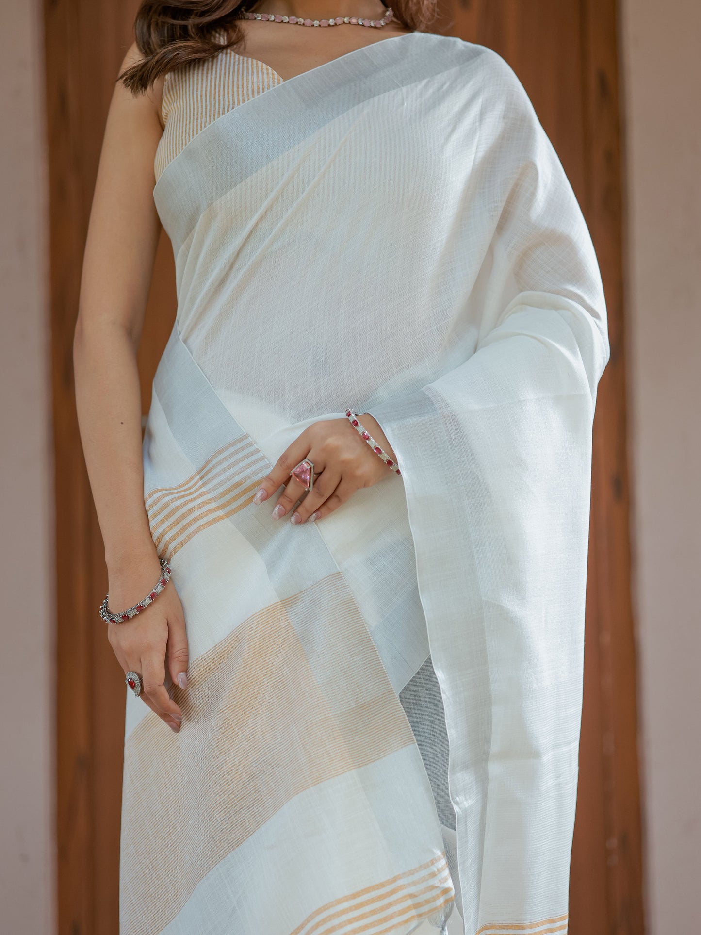 Pure White & Mustard Gold Handloom Mul Cotton Saree with Minimal Striped Border & Tassel Detailing