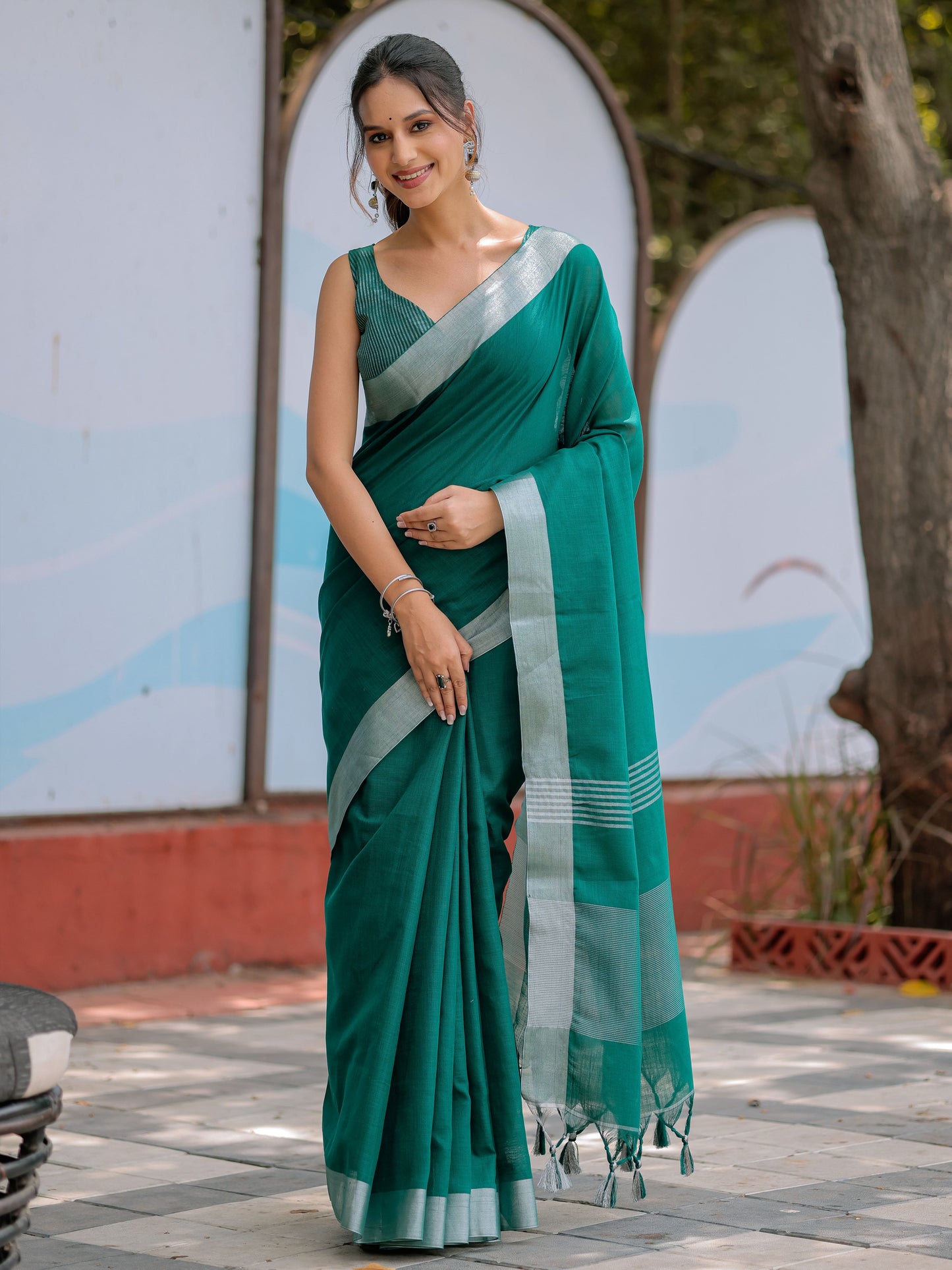 Elegant Emerald Green Pure Handloom Mul Cotton Saree with Silver Border & Tassel Detailing
