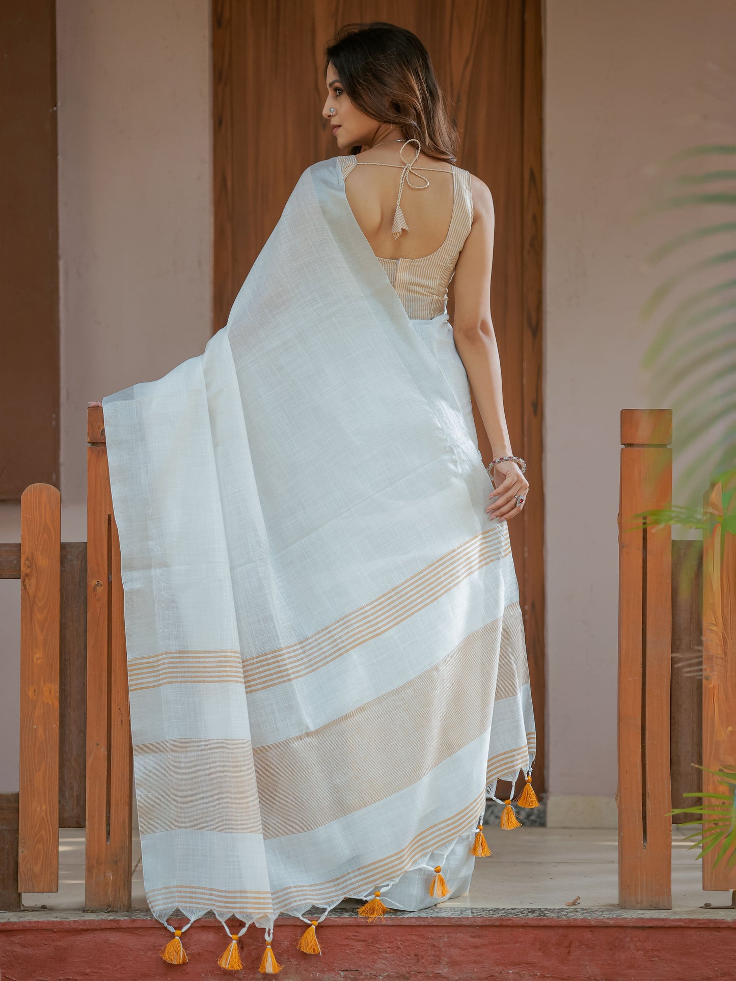 Pure White & Mustard Gold Handloom Mul Cotton Saree with Minimal Striped Border & Tassel Detailing