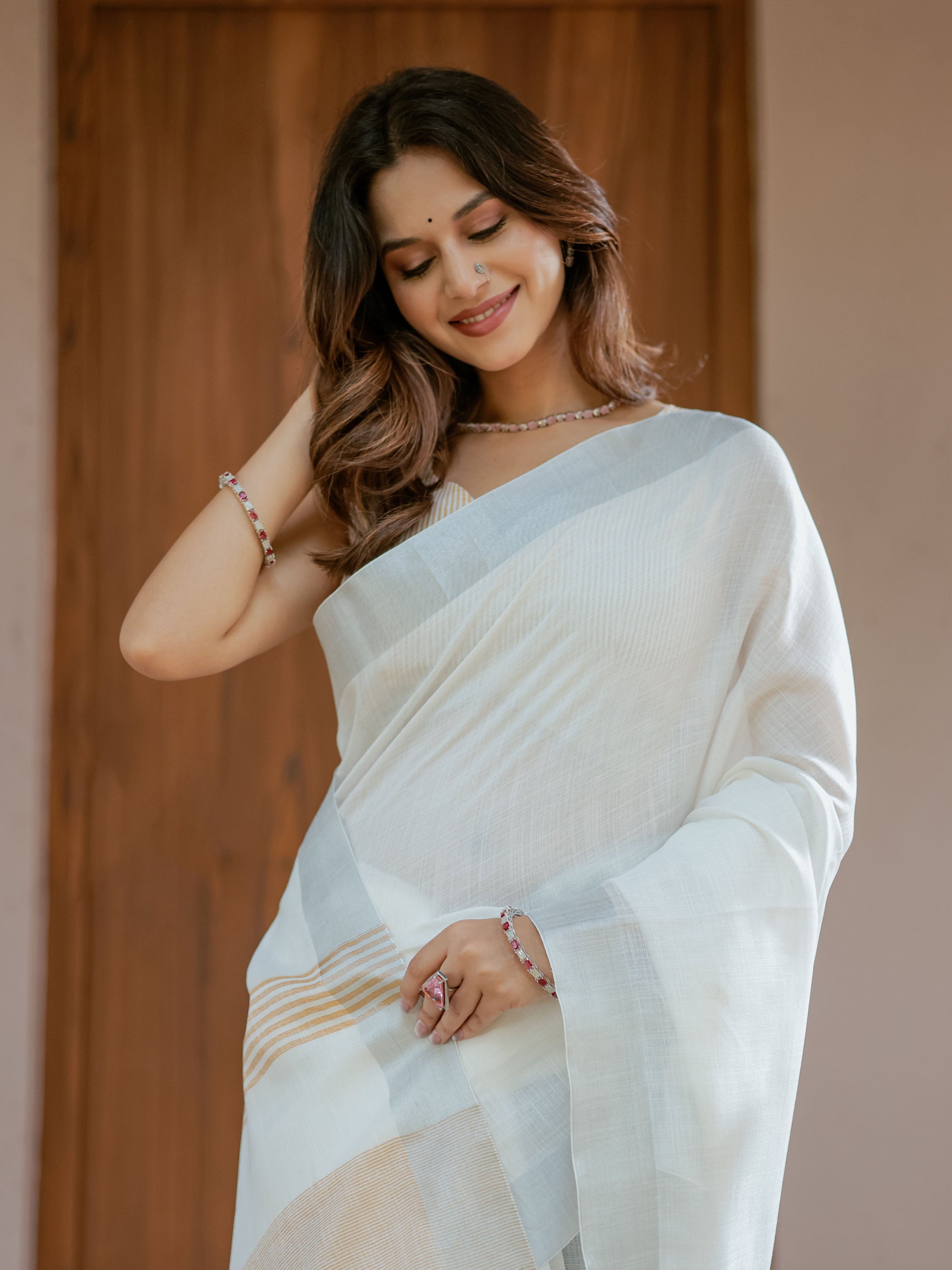 Pure White & Mustard Gold Handloom Mul Cotton Saree with Minimal Striped Border & Tassel Detailing