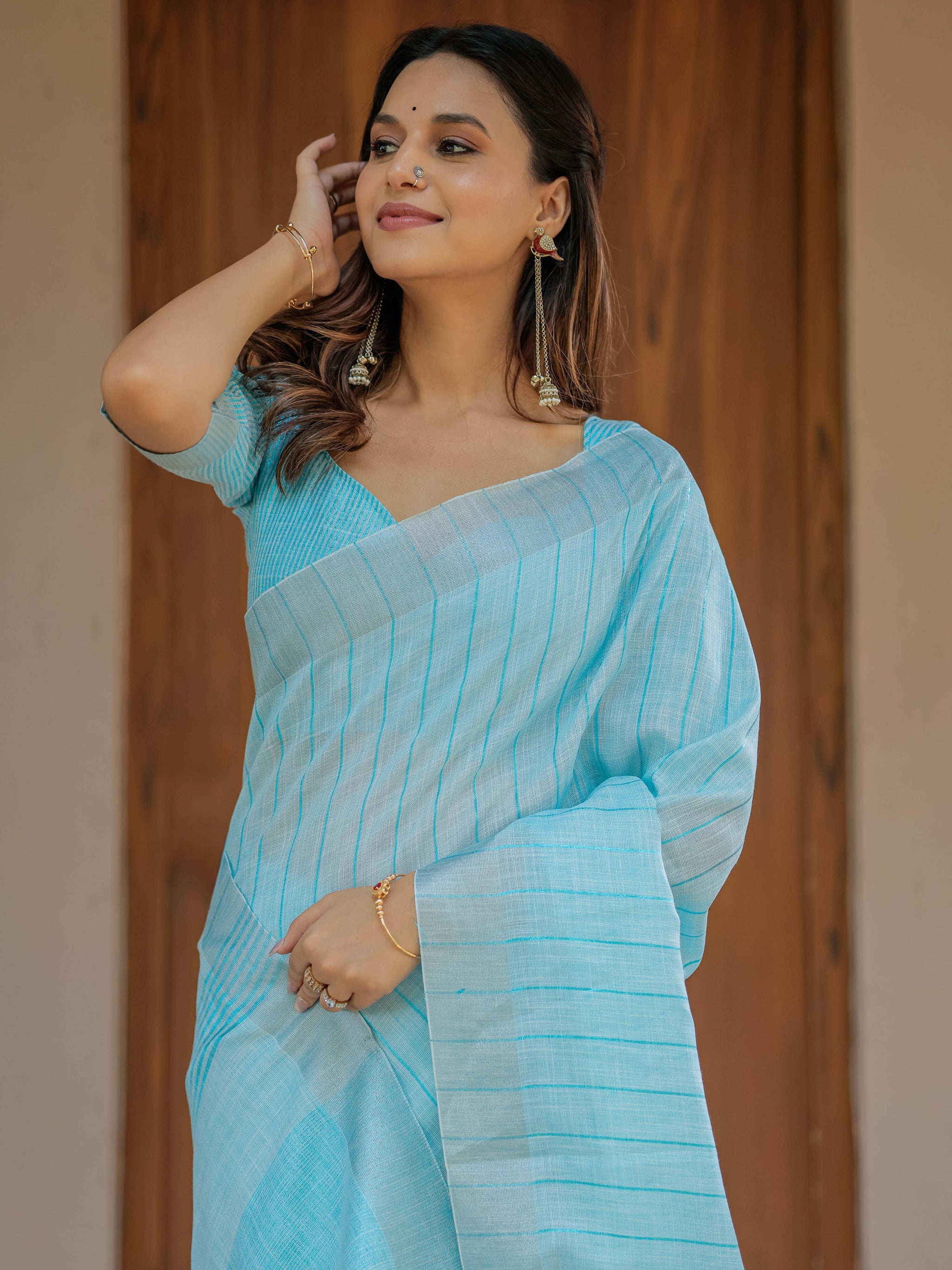 Aqua Blue Pure Handloom Mul Cotton Saree with Striped Weaving & Tassel Detailing