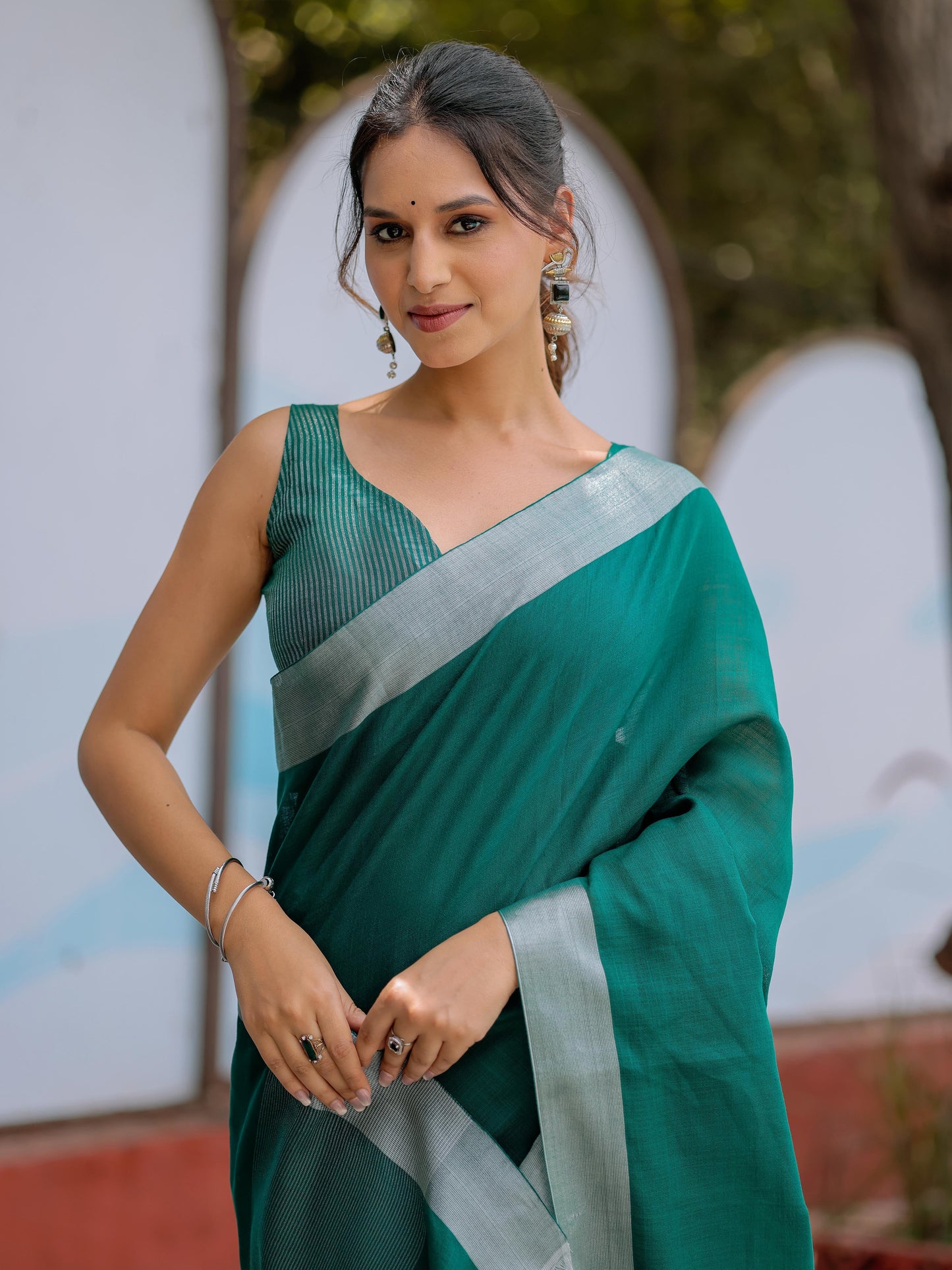 Elegant Emerald Green Pure Handloom Mul Cotton Saree with Silver Border & Tassel Detailing