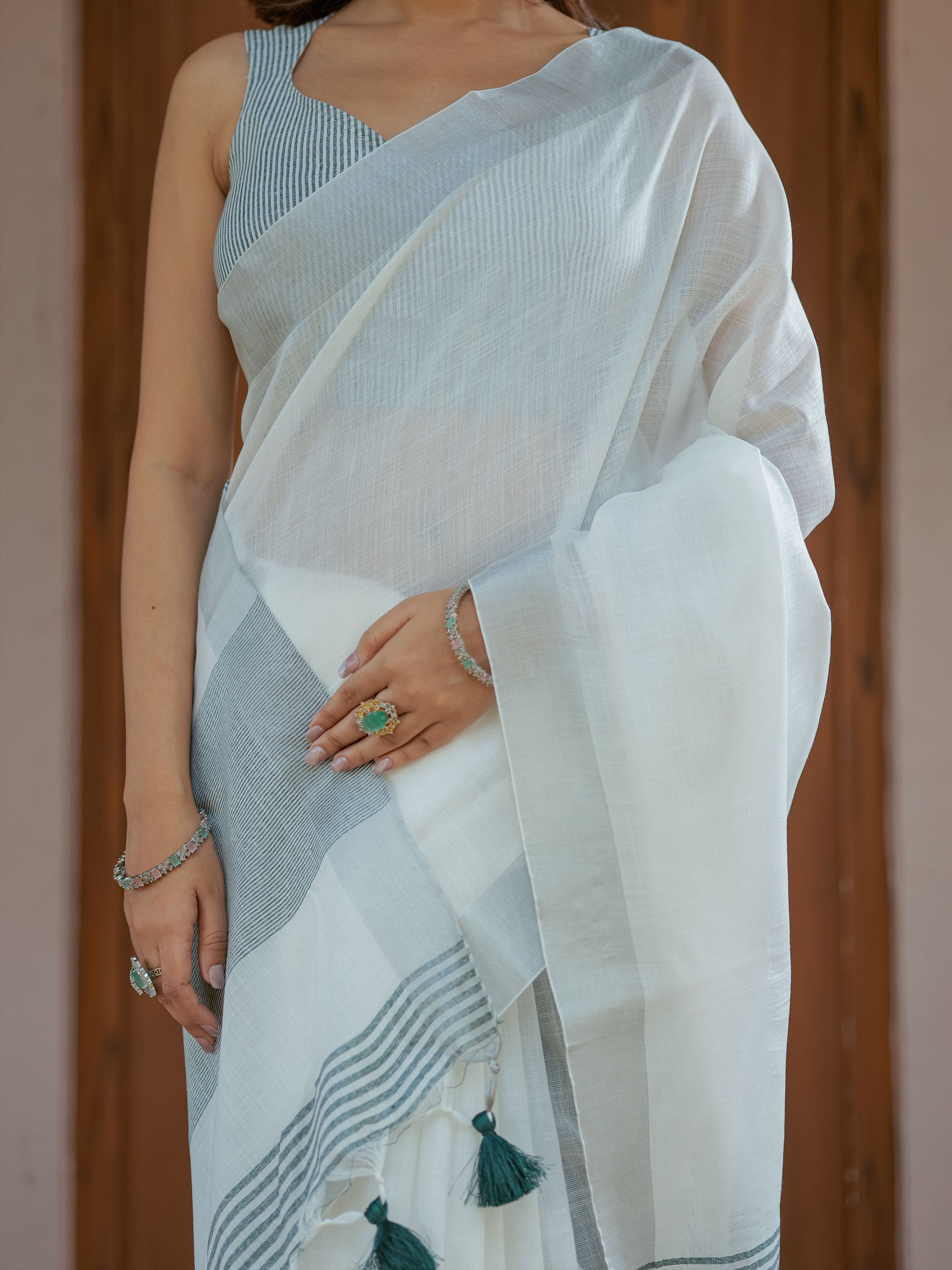 Pure White & Teal Blue Handloom Mul Cotton Saree with Minimal Striped Border & Tassel Detailing