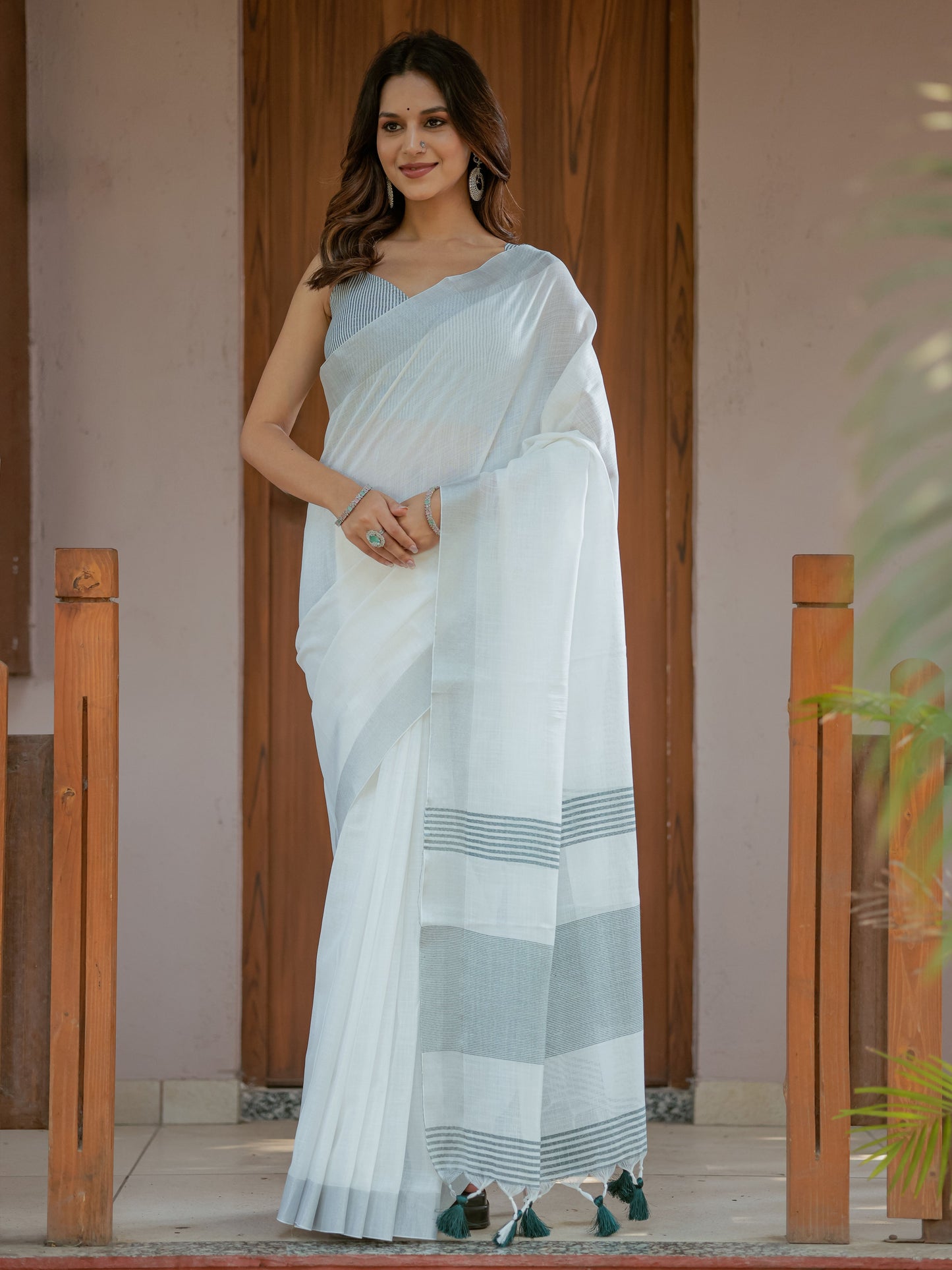 Pure White & Teal Blue Handloom Mul Cotton Saree with Minimal Striped Border & Tassel Detailing
