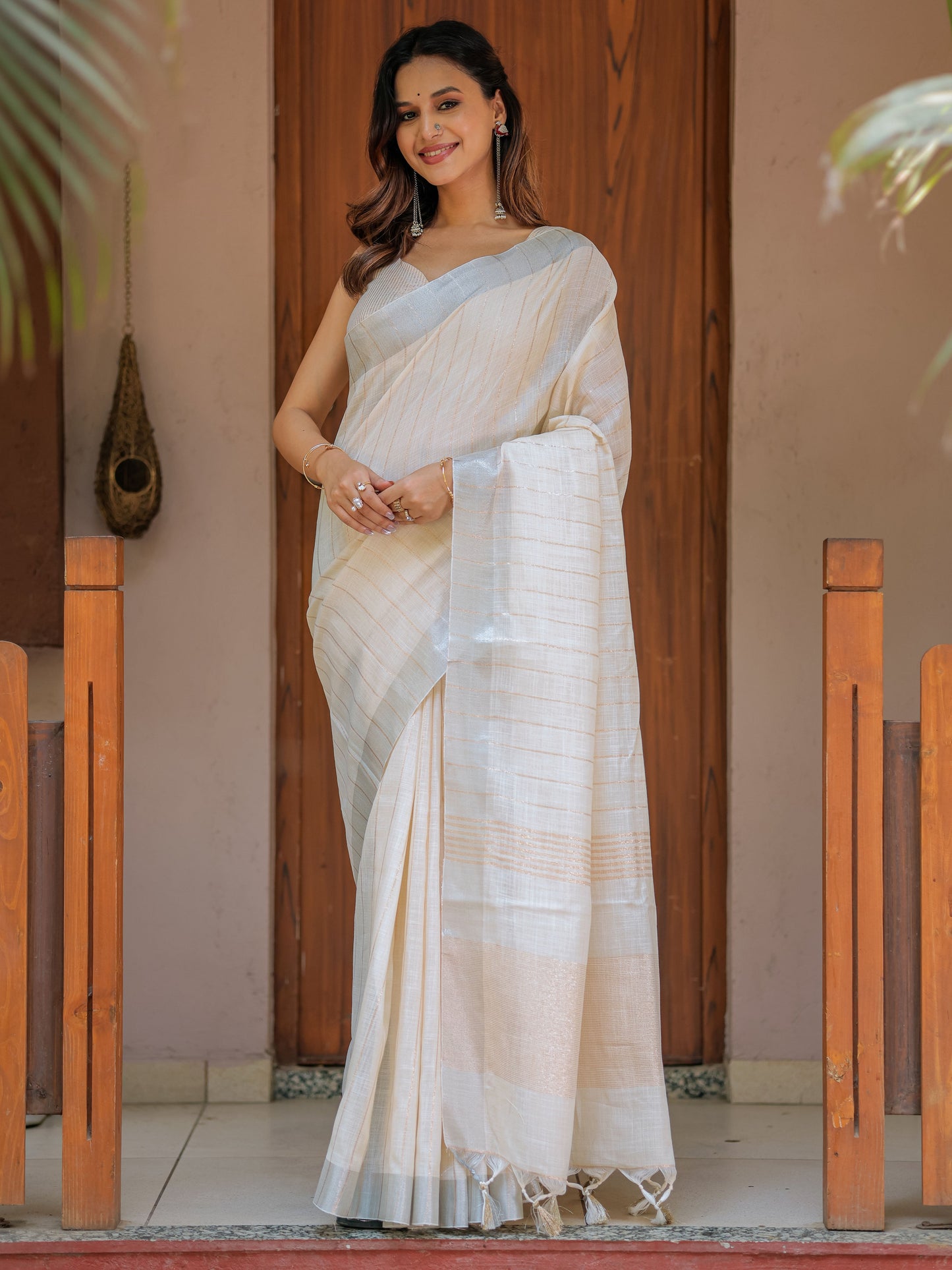 Ivory Cream Pure Handloom Mul Cotton Saree with Golden Striped Weaving & Tassel Detailing