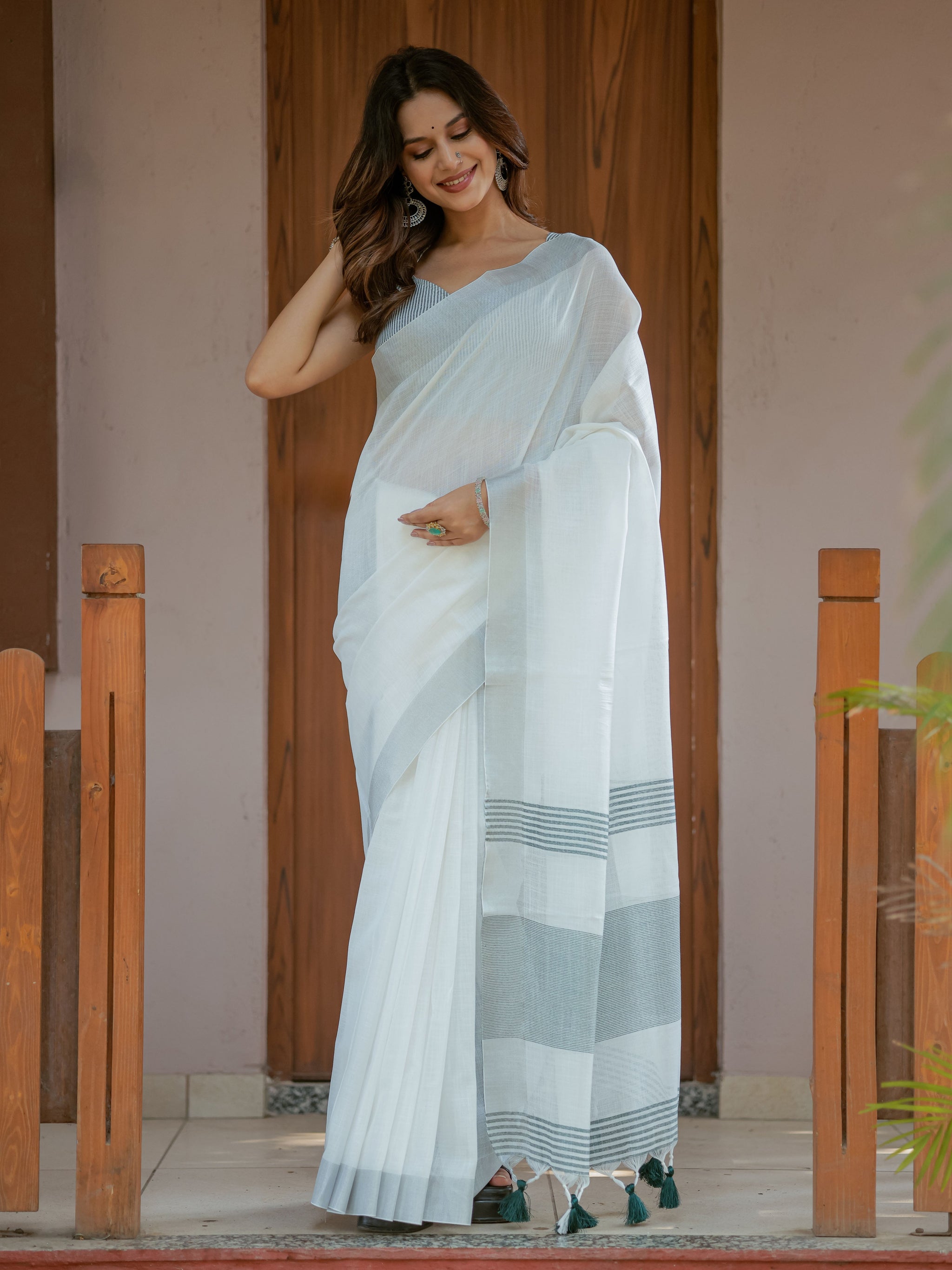 Pure White & Teal Blue Handloom Mul Cotton Saree with Minimal Striped Border & Tassel Detailing