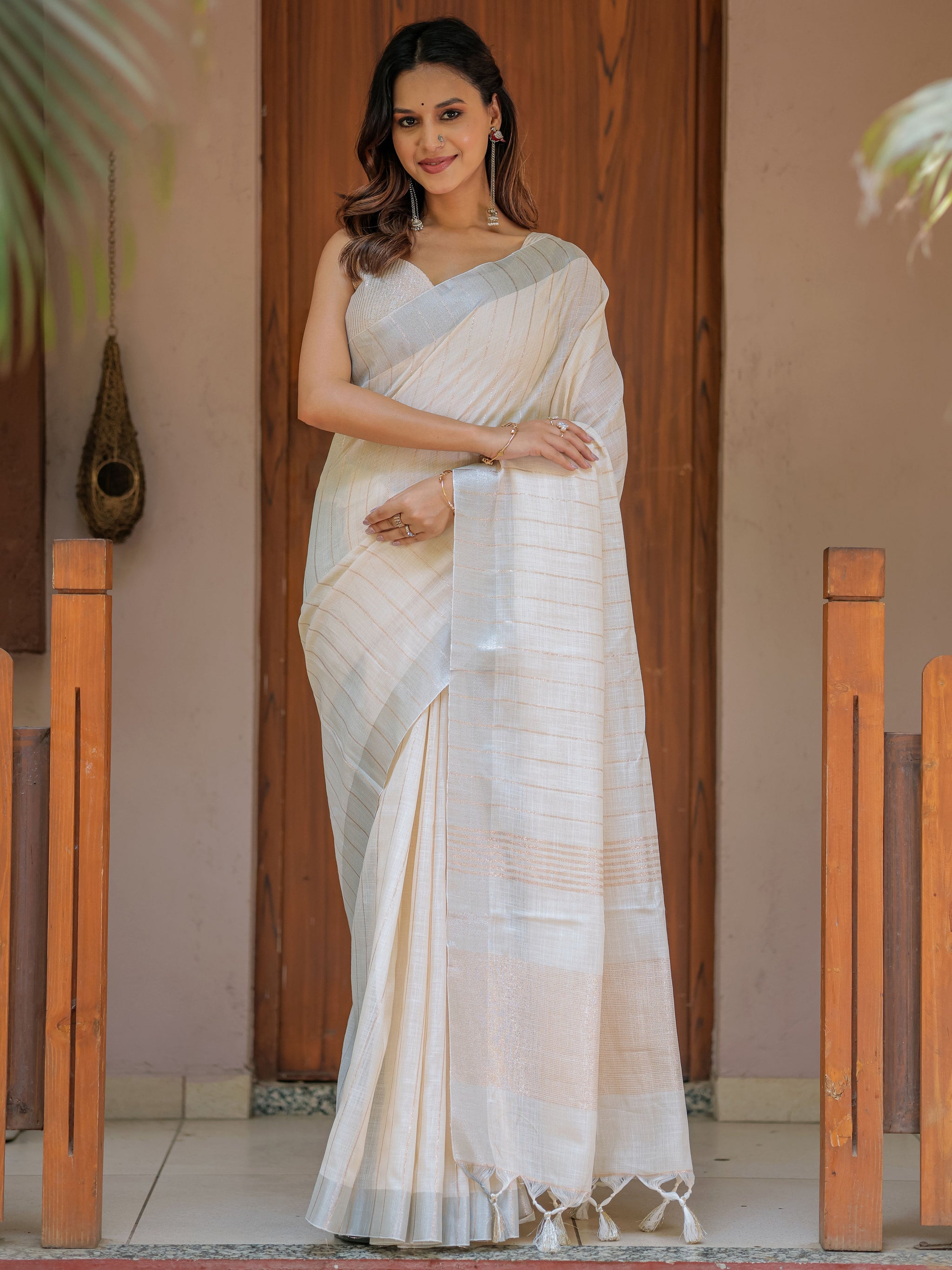 Ivory Cream Pure Handloom Mul Cotton Saree with Golden Striped Weaving & Tassel Detailing