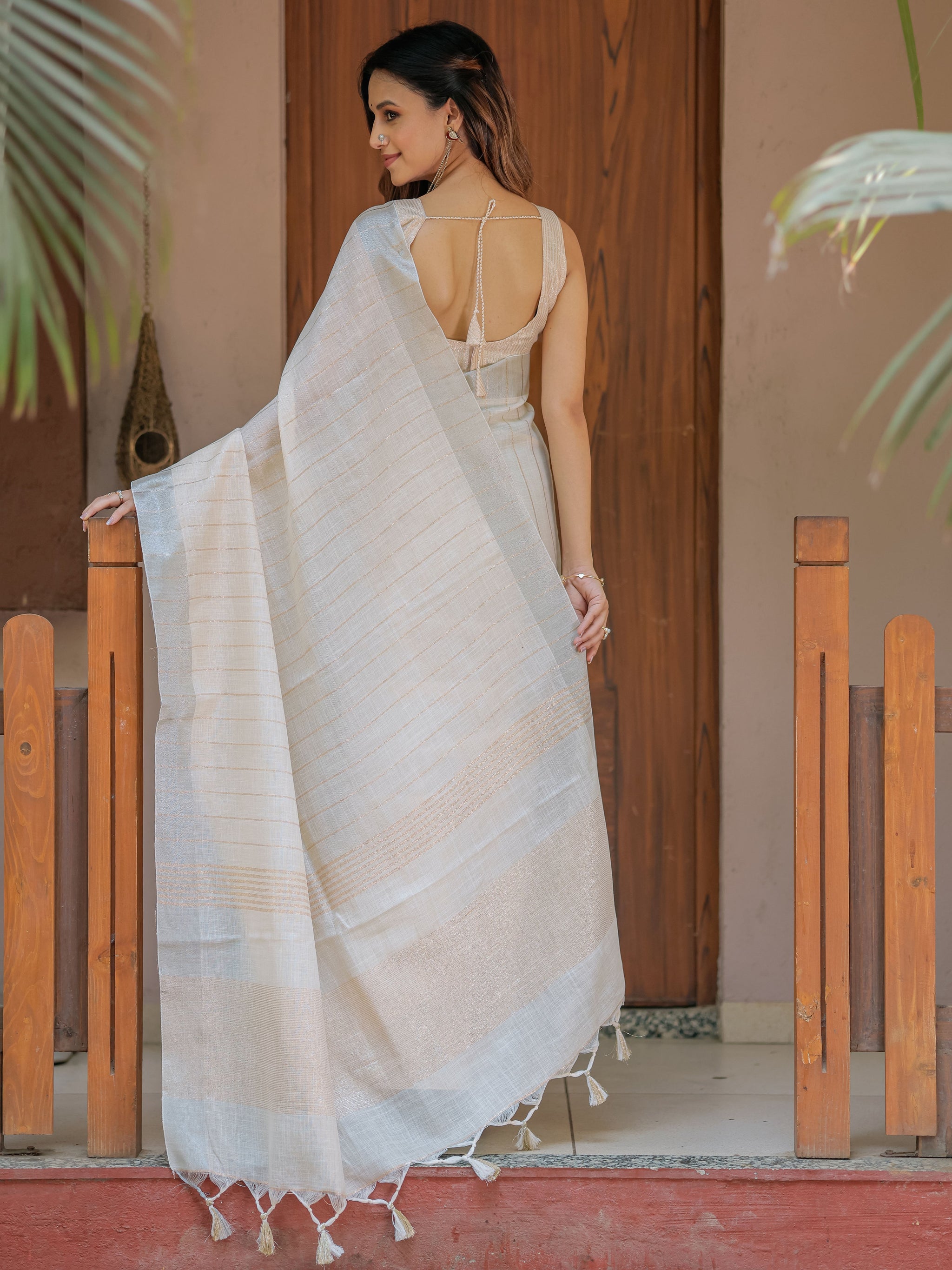 Ivory Cream Pure Handloom Mul Cotton Saree with Golden Striped Weaving & Tassel Detailing