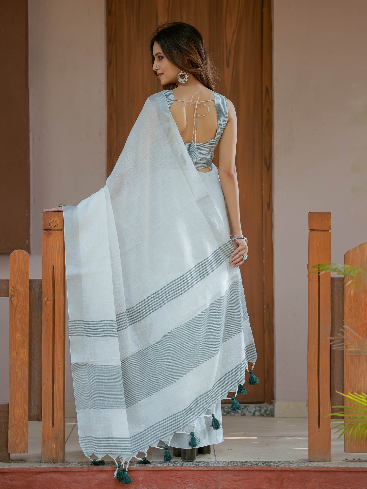 Pure White & Teal Blue Handloom Mul Cotton Saree with Minimal Striped Border & Tassel Detailing