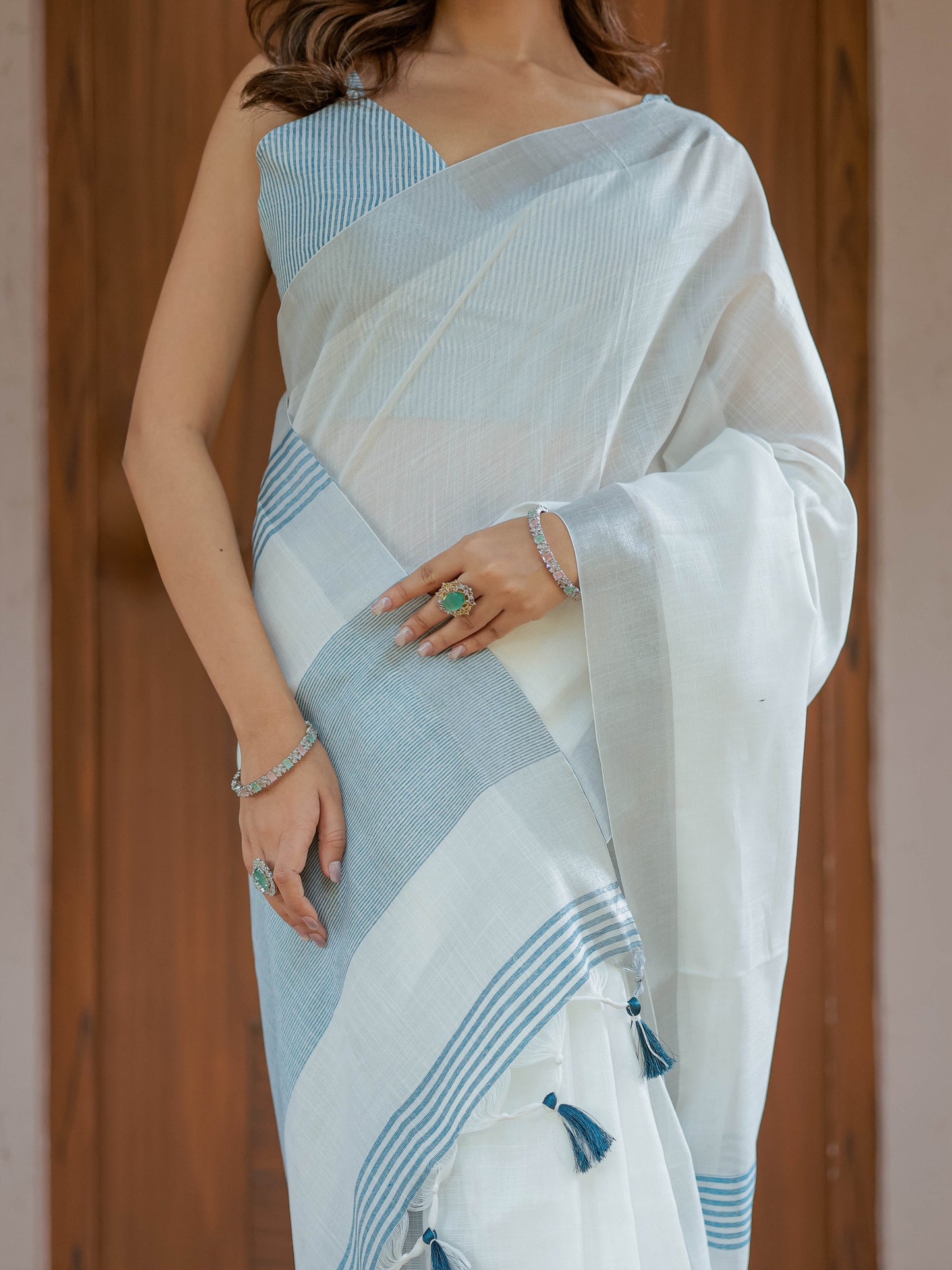 Pure White & Sky Blue Handloom Mul Cotton Saree with Minimal Striped Border & Tassel Detailing