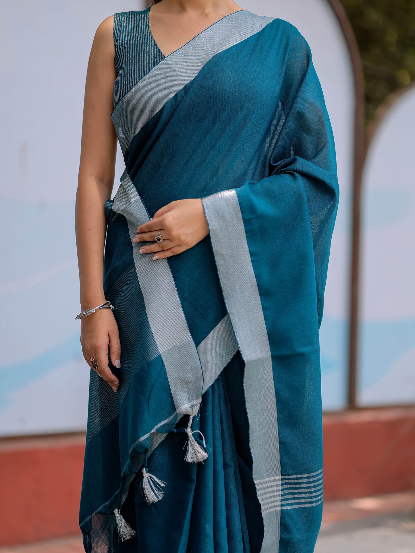 Elegant Teal Blue Pure Handloom Mul Cotton Saree with Silver Border & Tassel Detailing