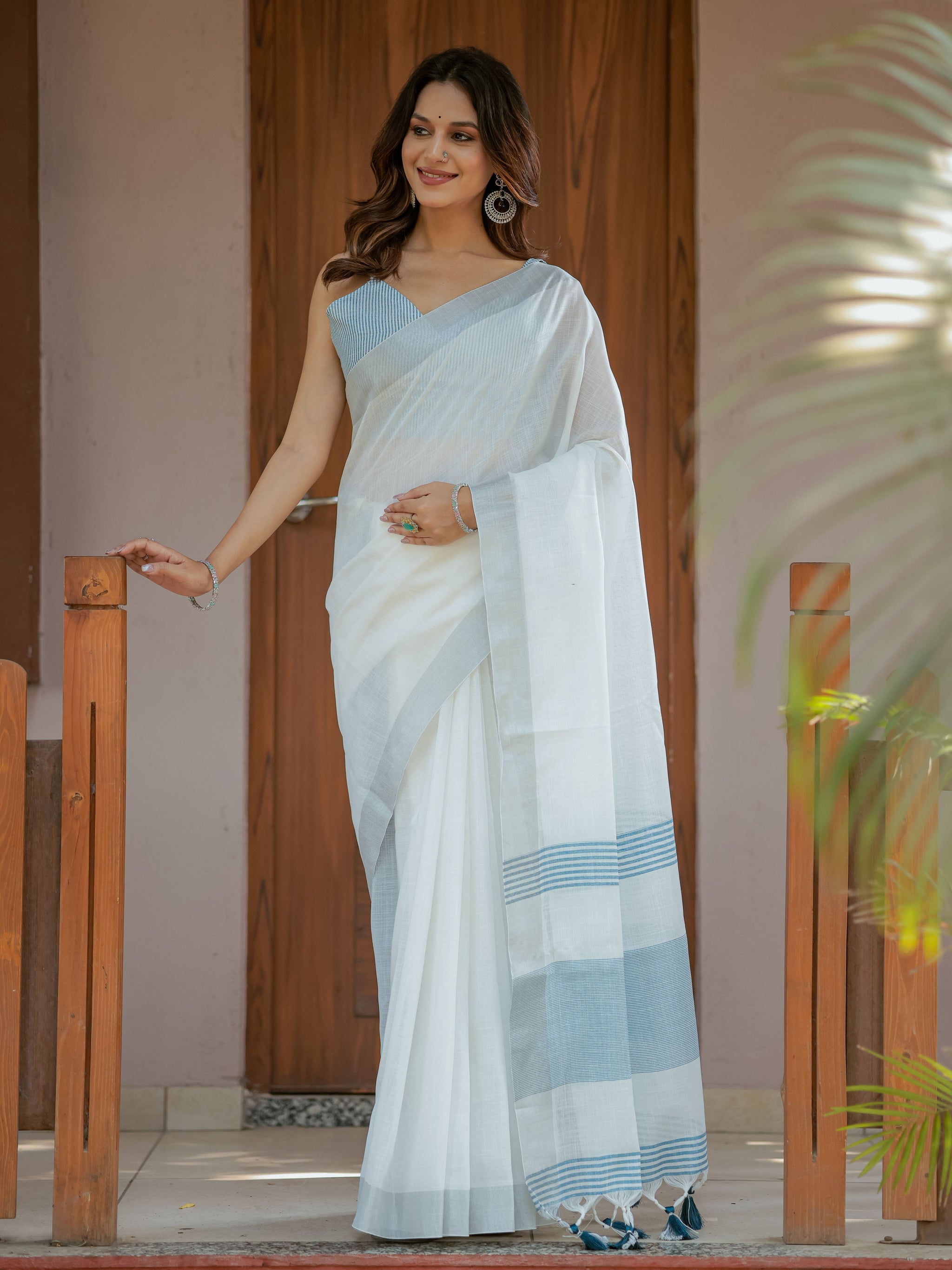Pure White & Sky Blue Handloom Mul Cotton Saree with Minimal Striped Border & Tassel Detailing