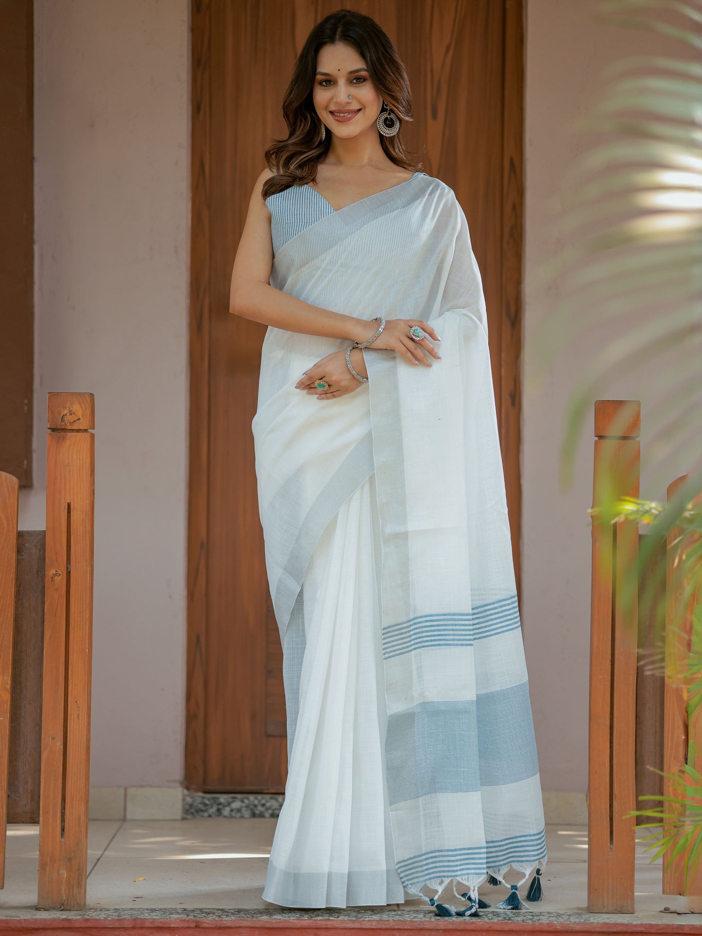Pure White & Sky Blue Handloom Mul Cotton Saree with Minimal Striped Border & Tassel Detailing