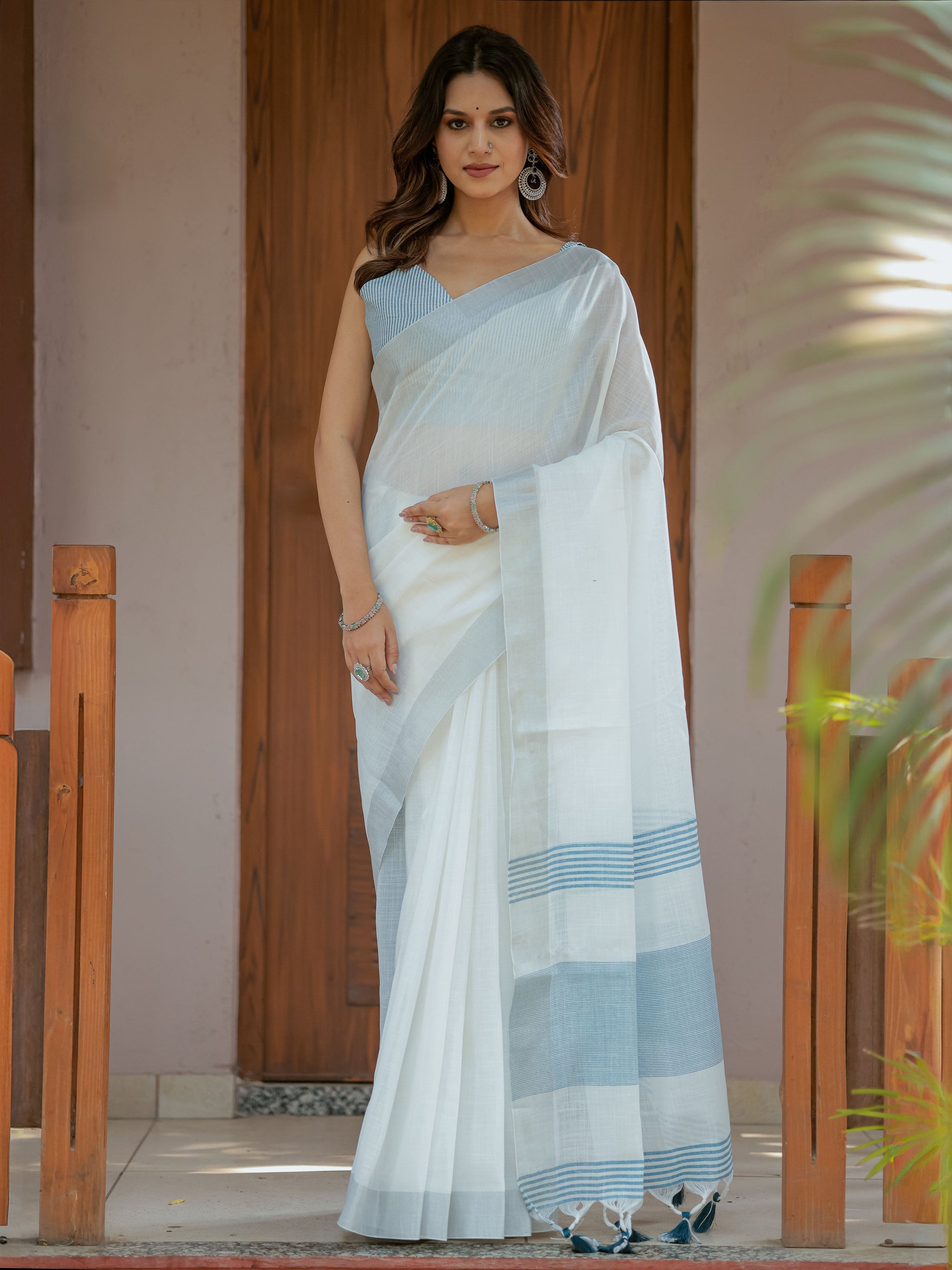 Pure White & Sky Blue Handloom Mul Cotton Saree with Minimal Striped Border & Tassel Detailing