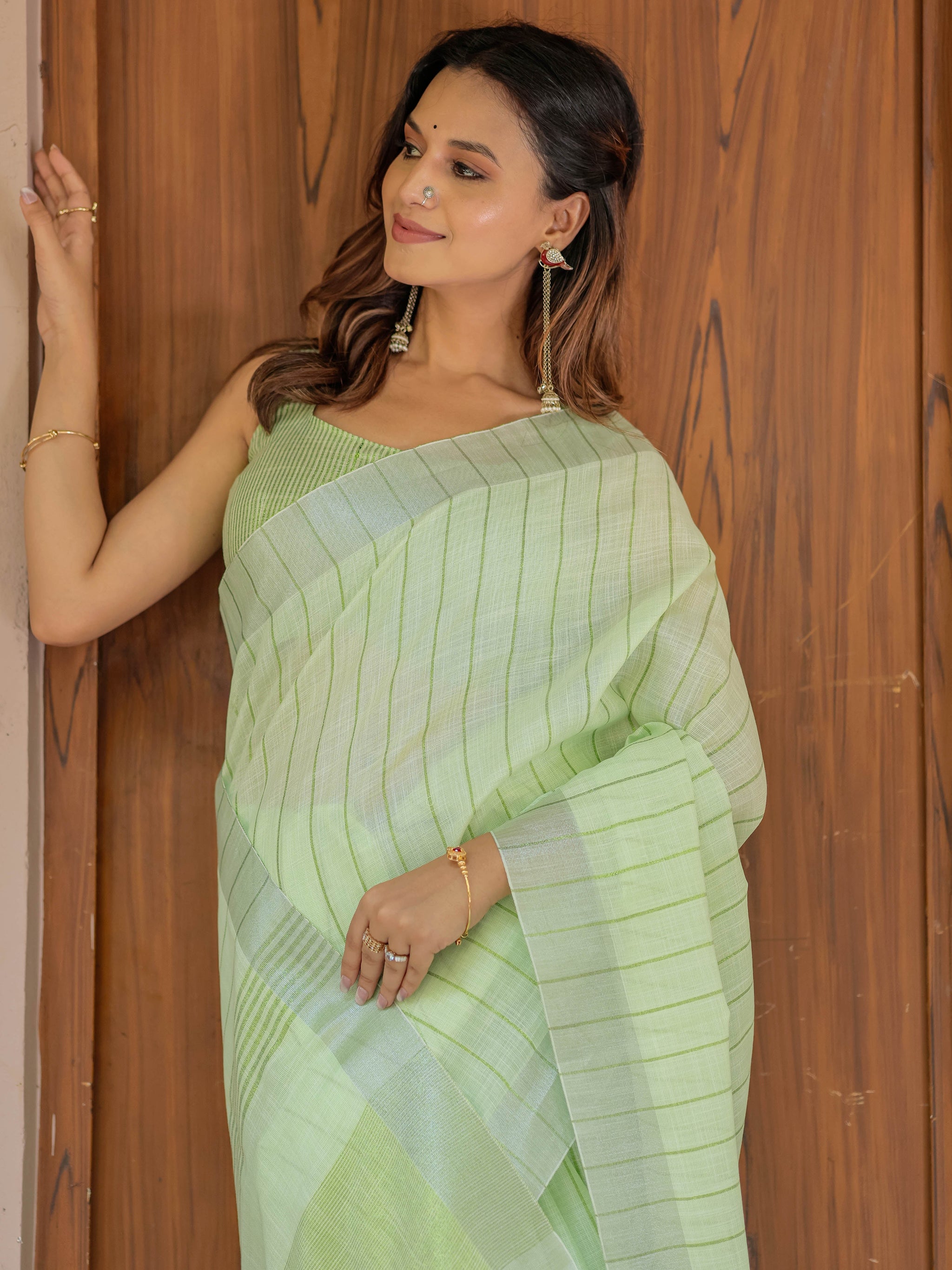Mint Green Pure Handloom Mul Cotton Saree with Striped Weaving & Tassel Detailing