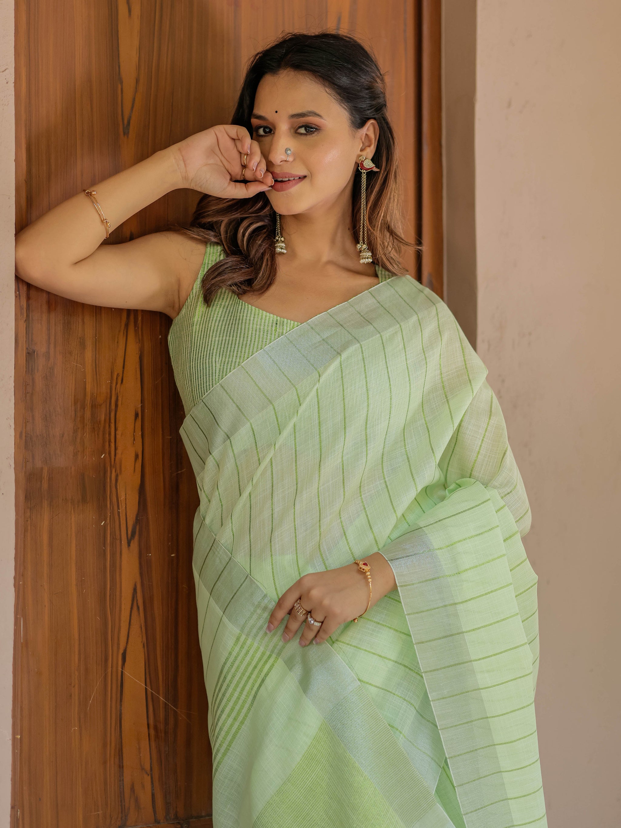 Mint Green Pure Handloom Mul Cotton Saree with Striped Weaving & Tassel Detailing