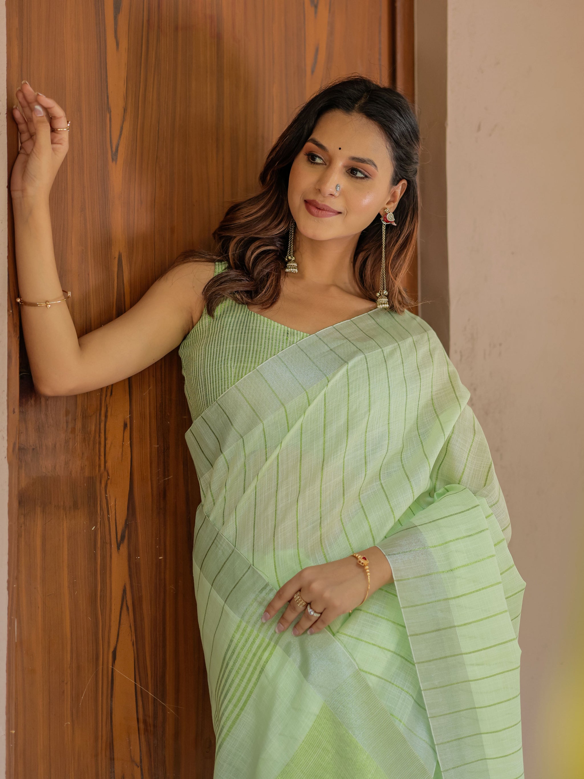 Mint Green Pure Handloom Mul Cotton Saree with Striped Weaving & Tassel Detailing