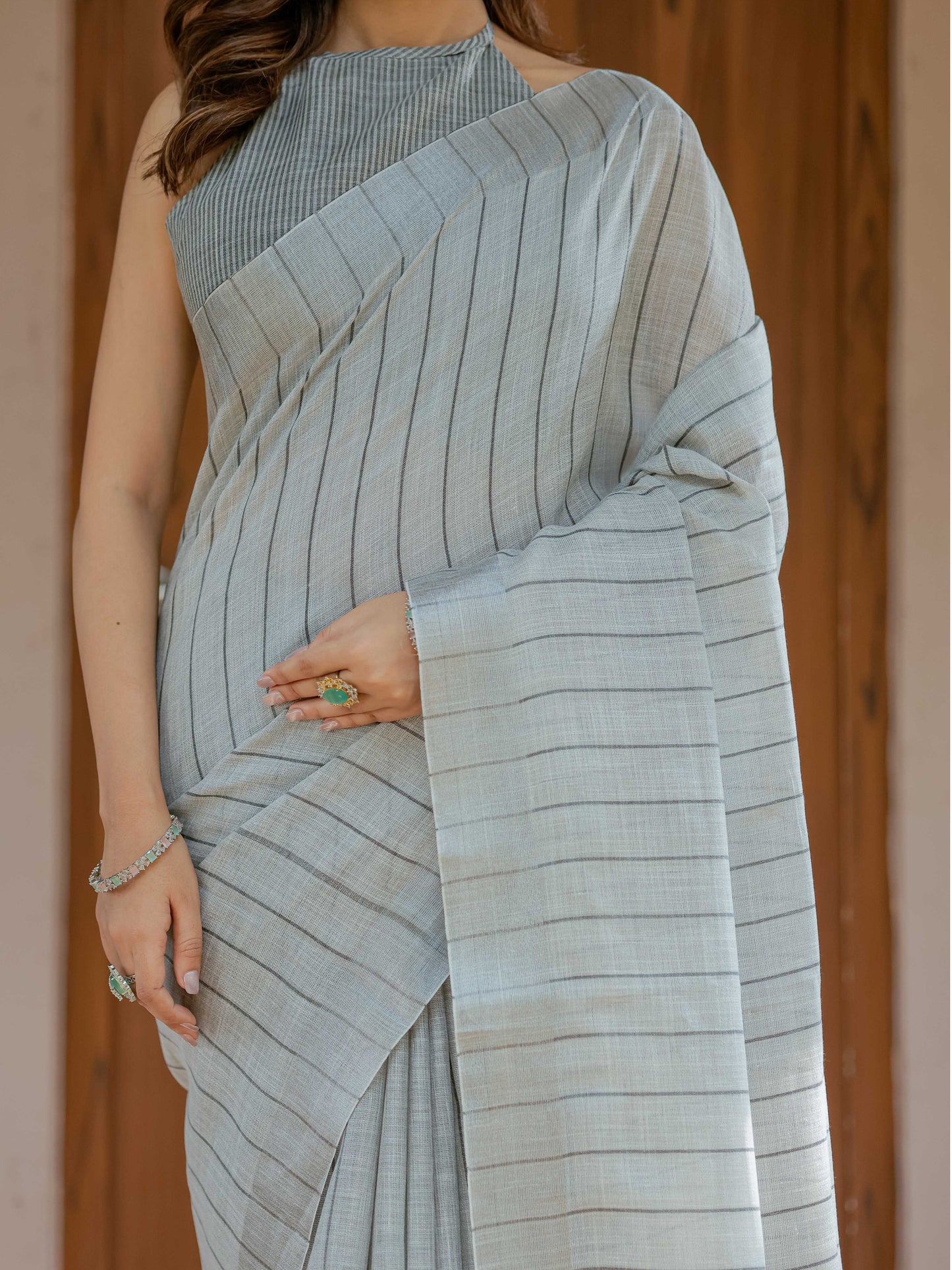 Elegant Ash Grey Handloom Mul Cotton Saree with Minimal Striped Weaving & Tassel Detailing