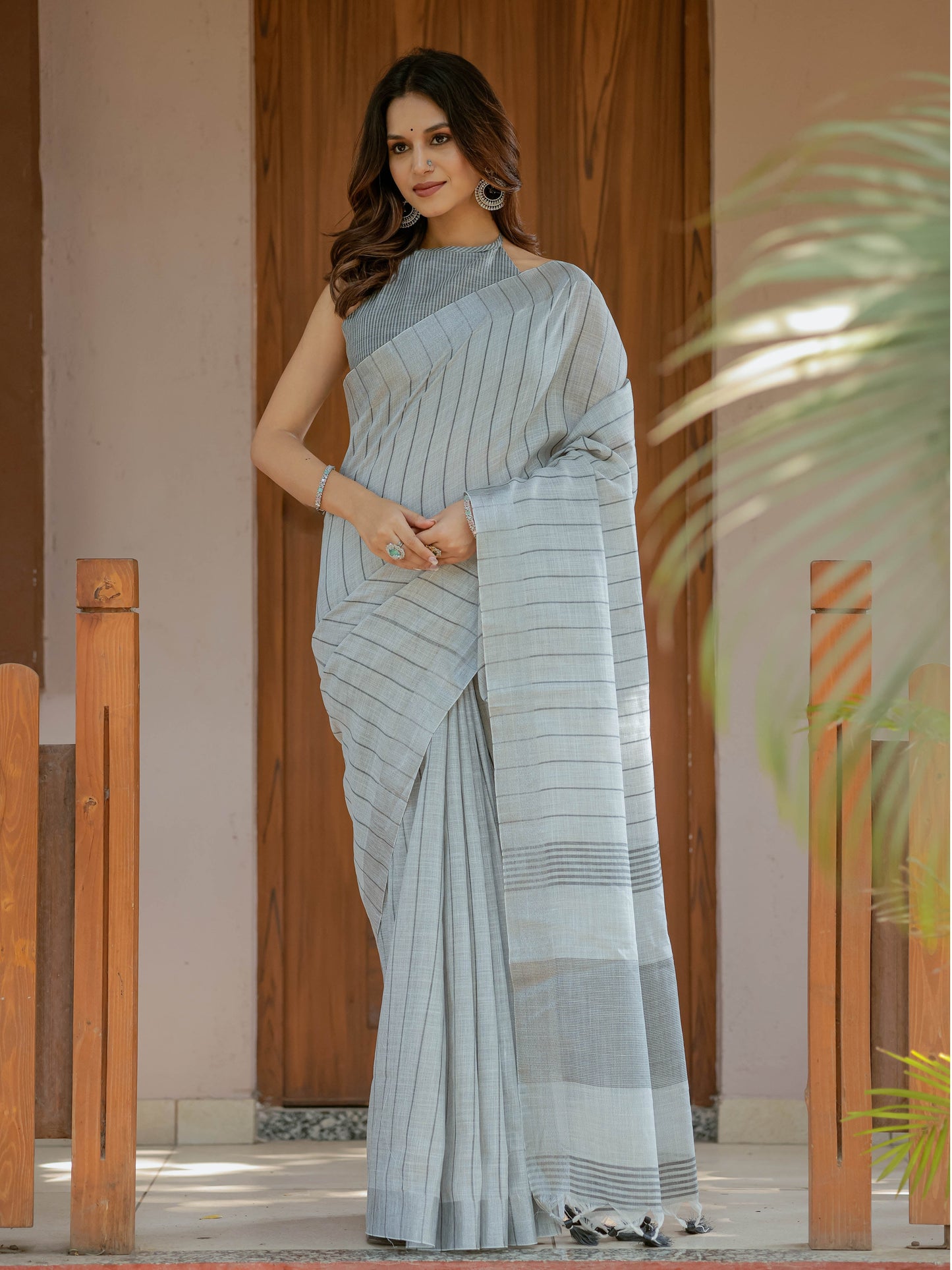 Elegant Ash Grey Handloom Mul Cotton Saree with Minimal Striped Weaving & Tassel Detailing