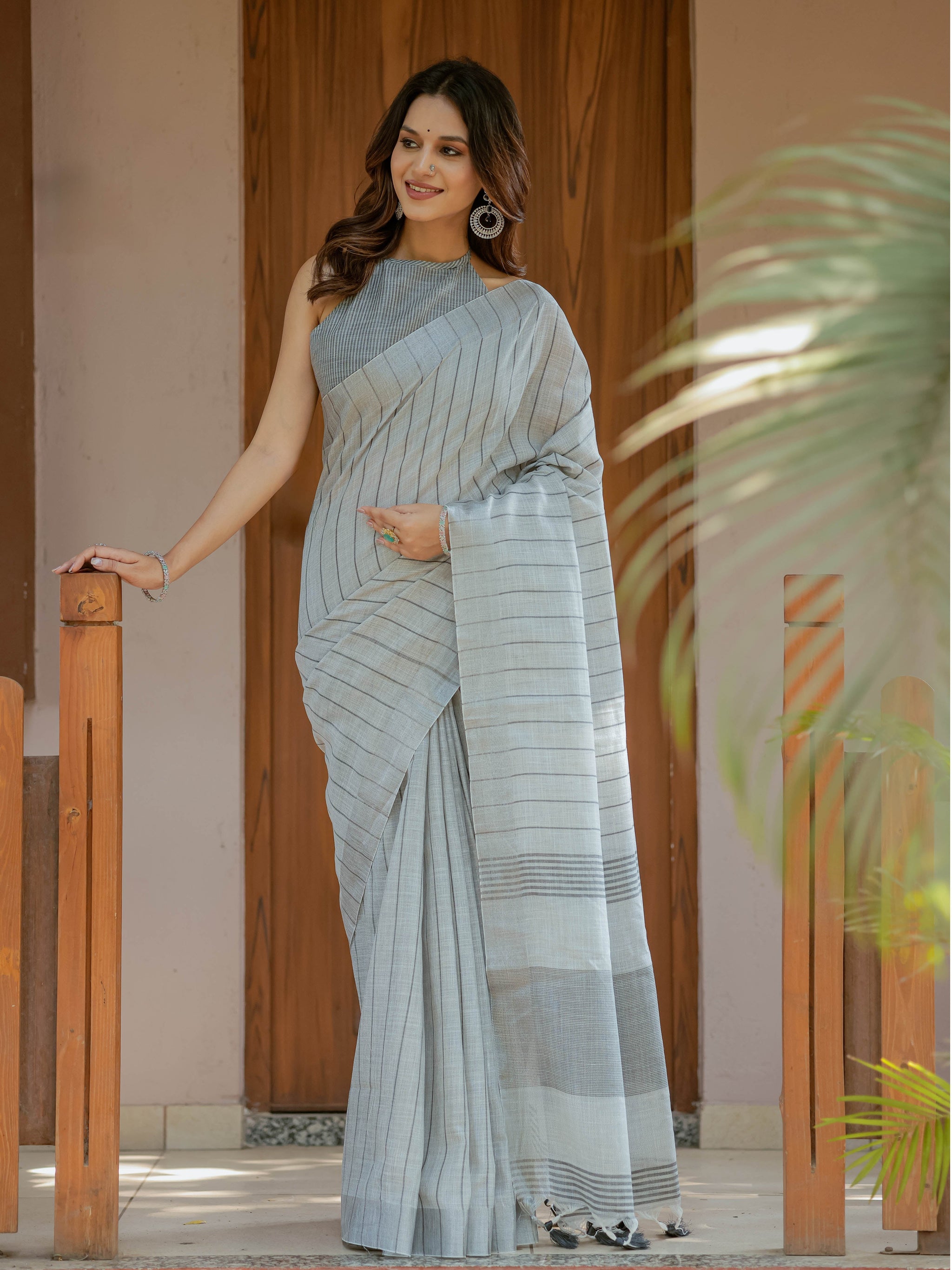 Elegant Ash Grey Handloom Mul Cotton Saree with Minimal Striped Weaving & Tassel Detailing