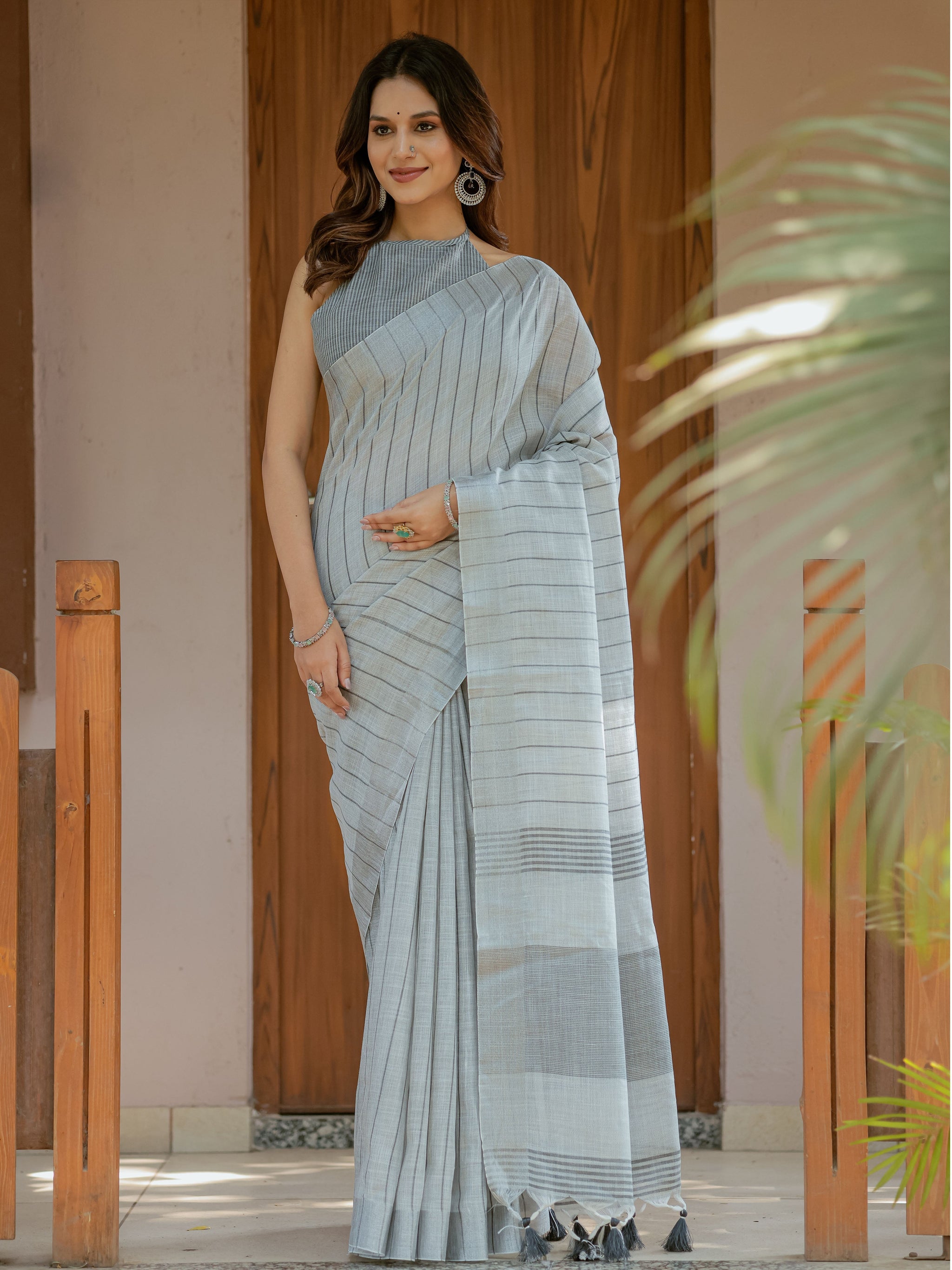 Elegant Ash Grey Handloom Mul Cotton Saree with Minimal Striped Weaving & Tassel Detailing