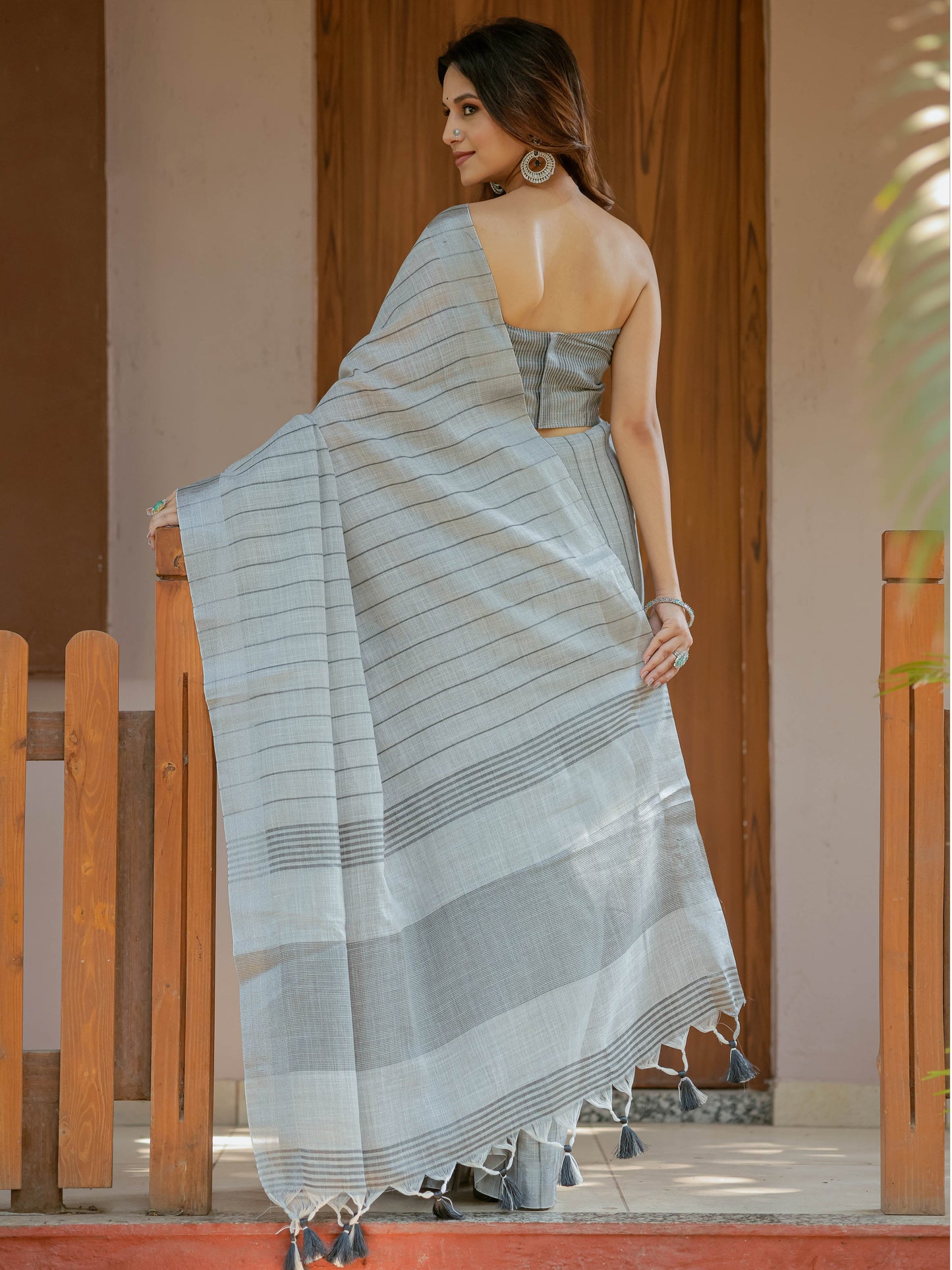 Elegant Ash Grey Handloom Mul Cotton Saree with Minimal Striped Weaving & Tassel Detailing
