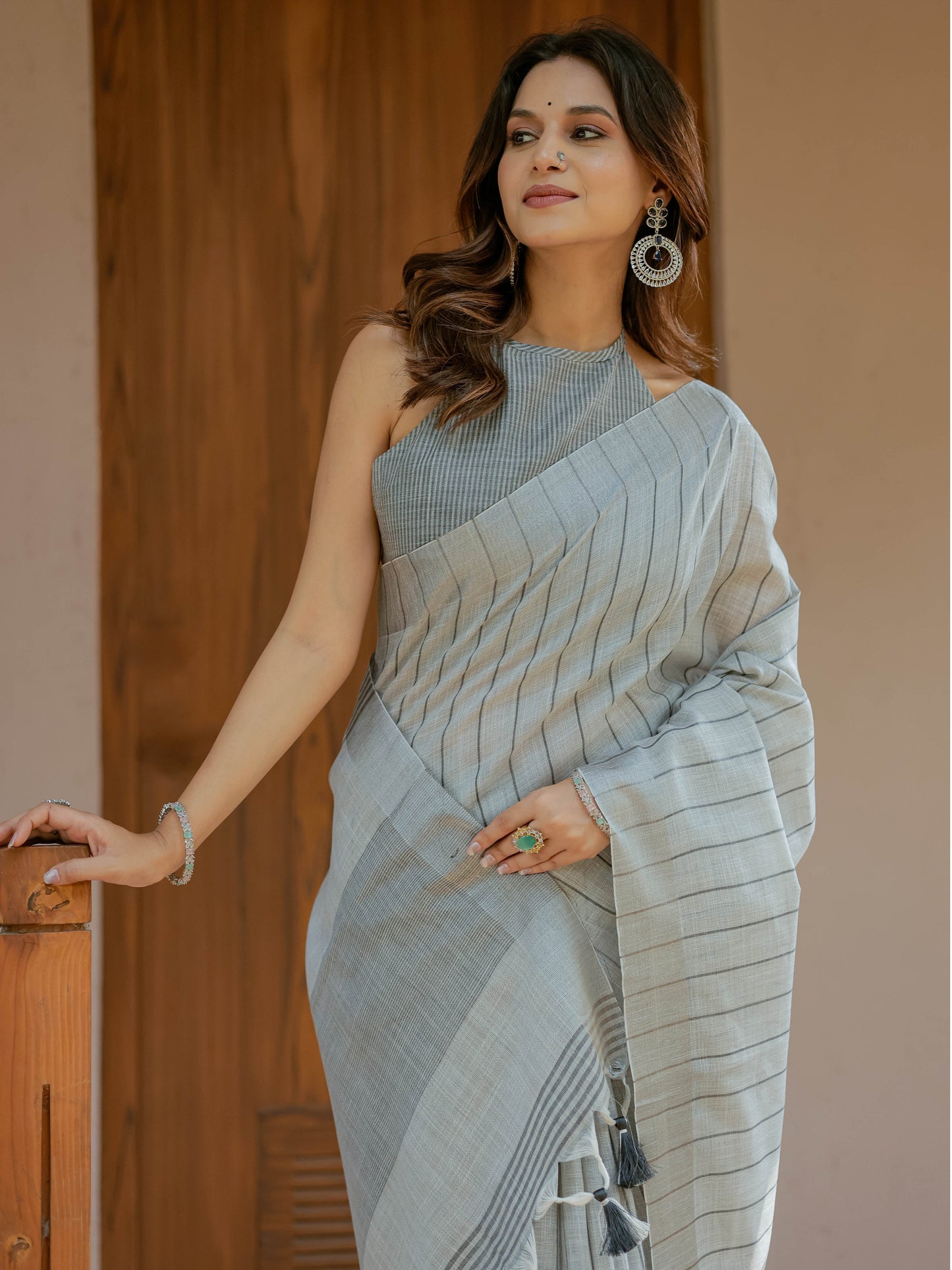 Elegant Ash Grey Handloom Mul Cotton Saree with Minimal Striped Weaving & Tassel Detailing