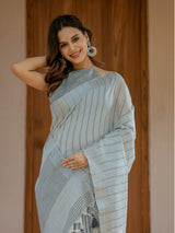 Elegant Ash Grey Handloom Mul Cotton Saree with Minimal Striped Weaving & Tassel Detailing