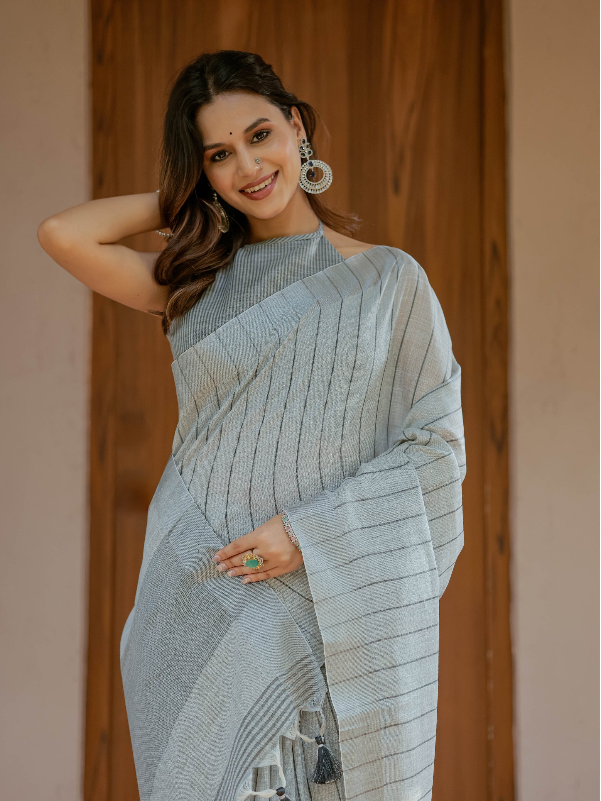 Elegant Ash Grey Handloom Mul Cotton Saree with Minimal Striped Weaving & Tassel Detailing