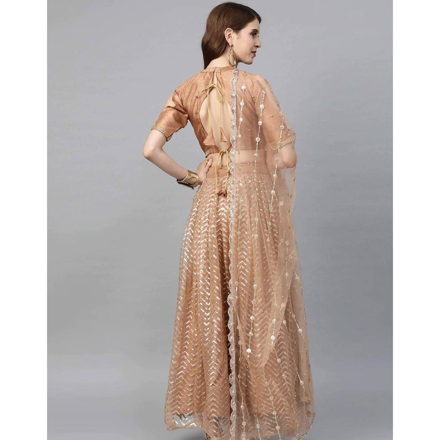 Peach color Net Lehenga with Heavy Embroidery, Zari and Thread work
