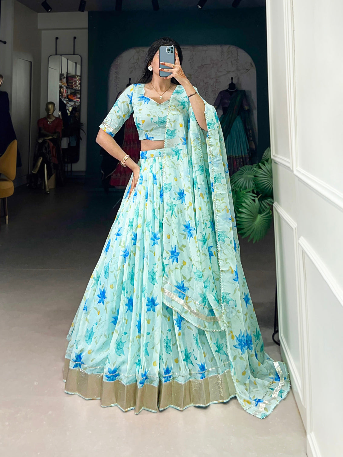 Pista green tabby silk lehenga choli with floral print lace border dupatta