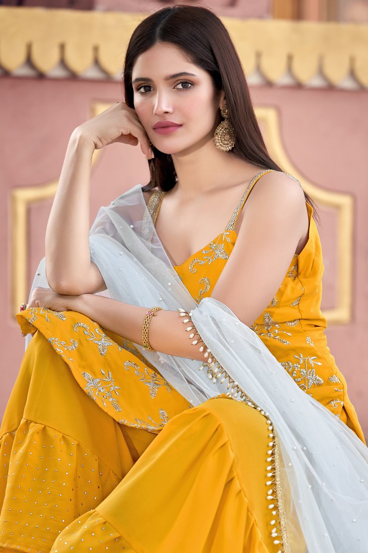 Mustard Yellow Semi Stitched Kurti And Sharara Set For Party Wear