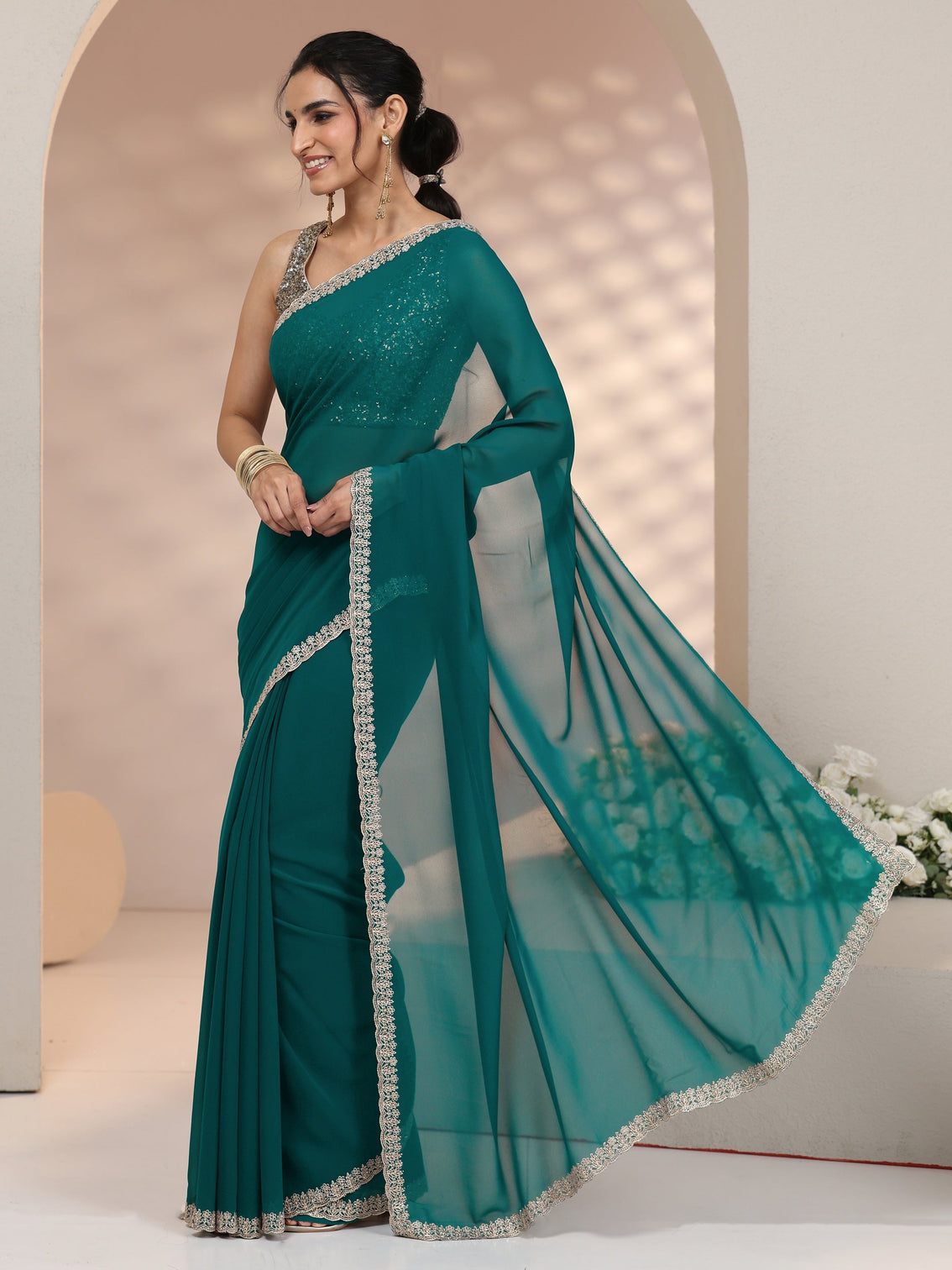 Mameraa Teal Green Georgette Saree with Embroidered Border