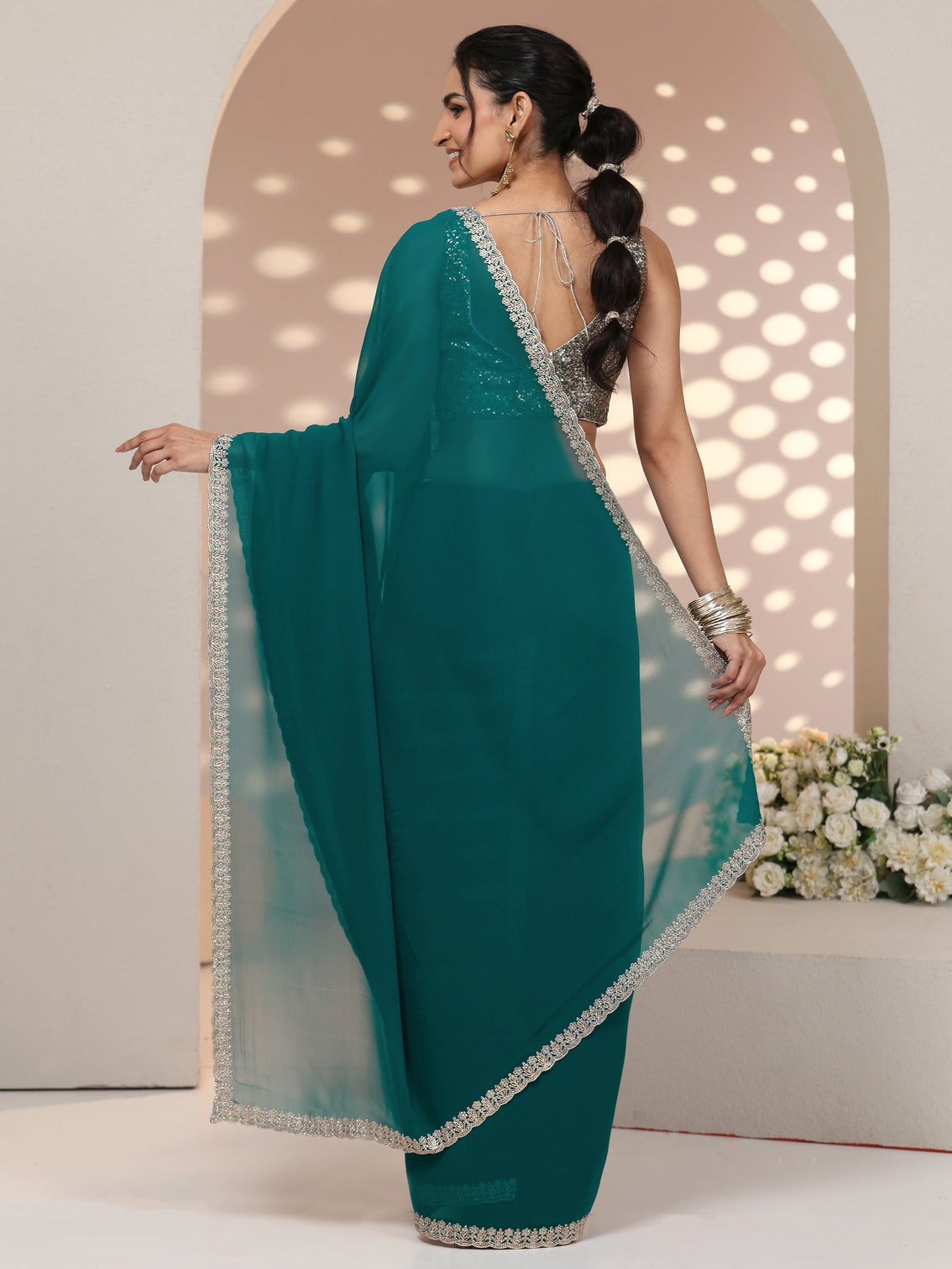 Mameraa Teal Green Georgette Saree with Embroidered Border