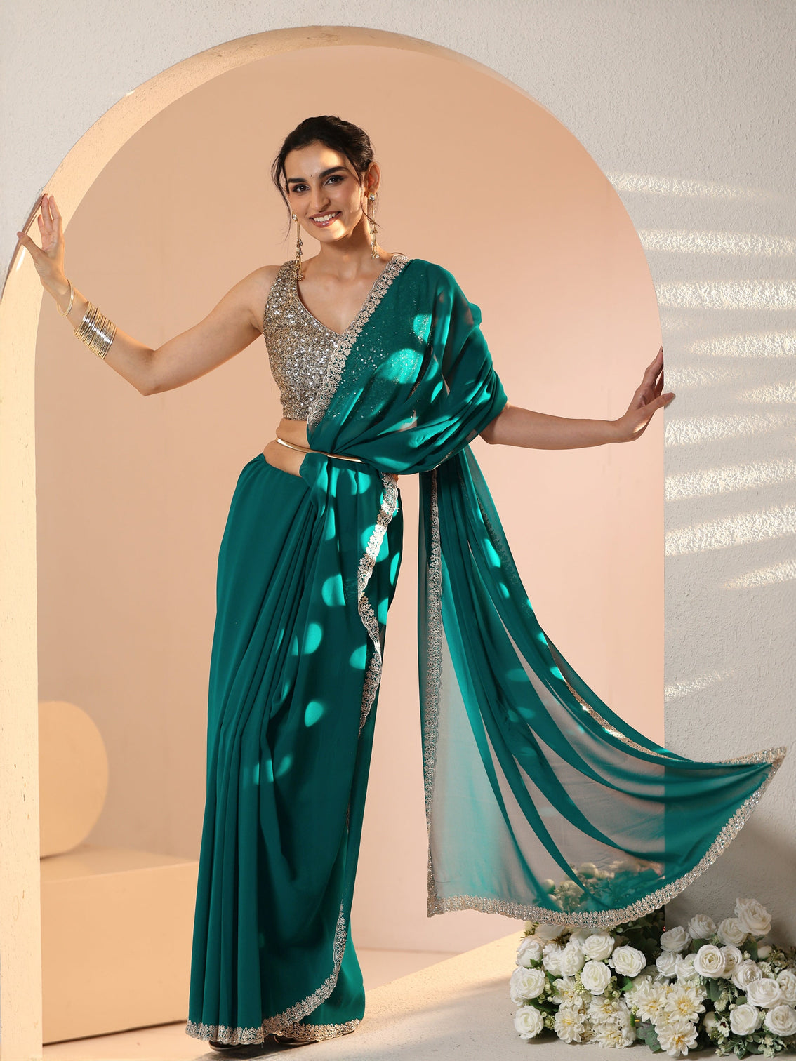 Mameraa Teal Green Georgette Saree with Embroidered Border