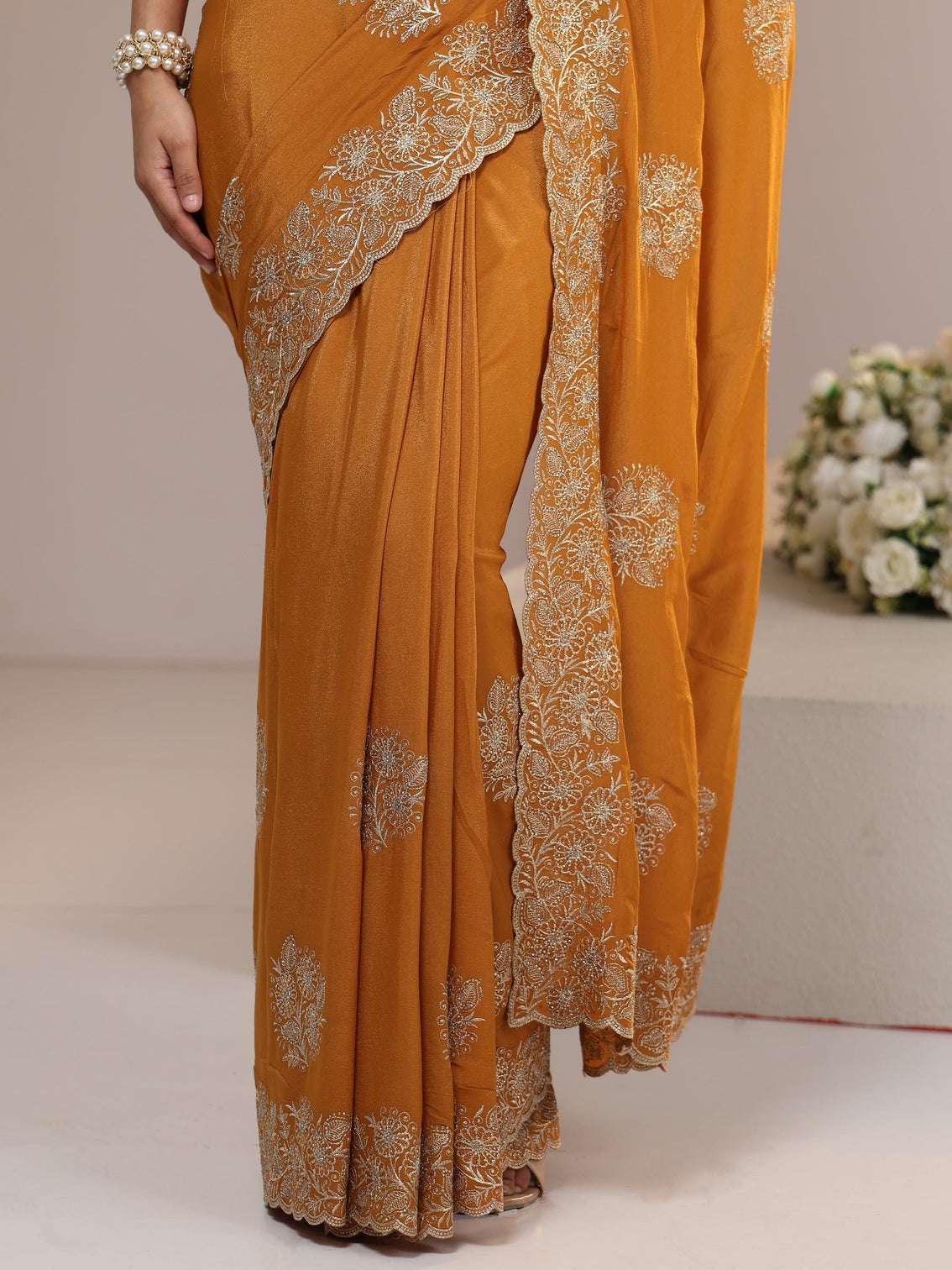 Mameraa Burnt Orange Satin Saree with Embroidered Floral Motifs